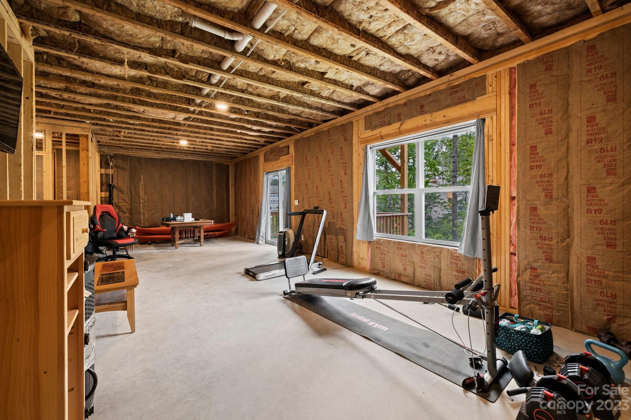 38 Hamrick Drive Candler, NC 28715 - Photo 32 of 37 a view of a room with gym equipment