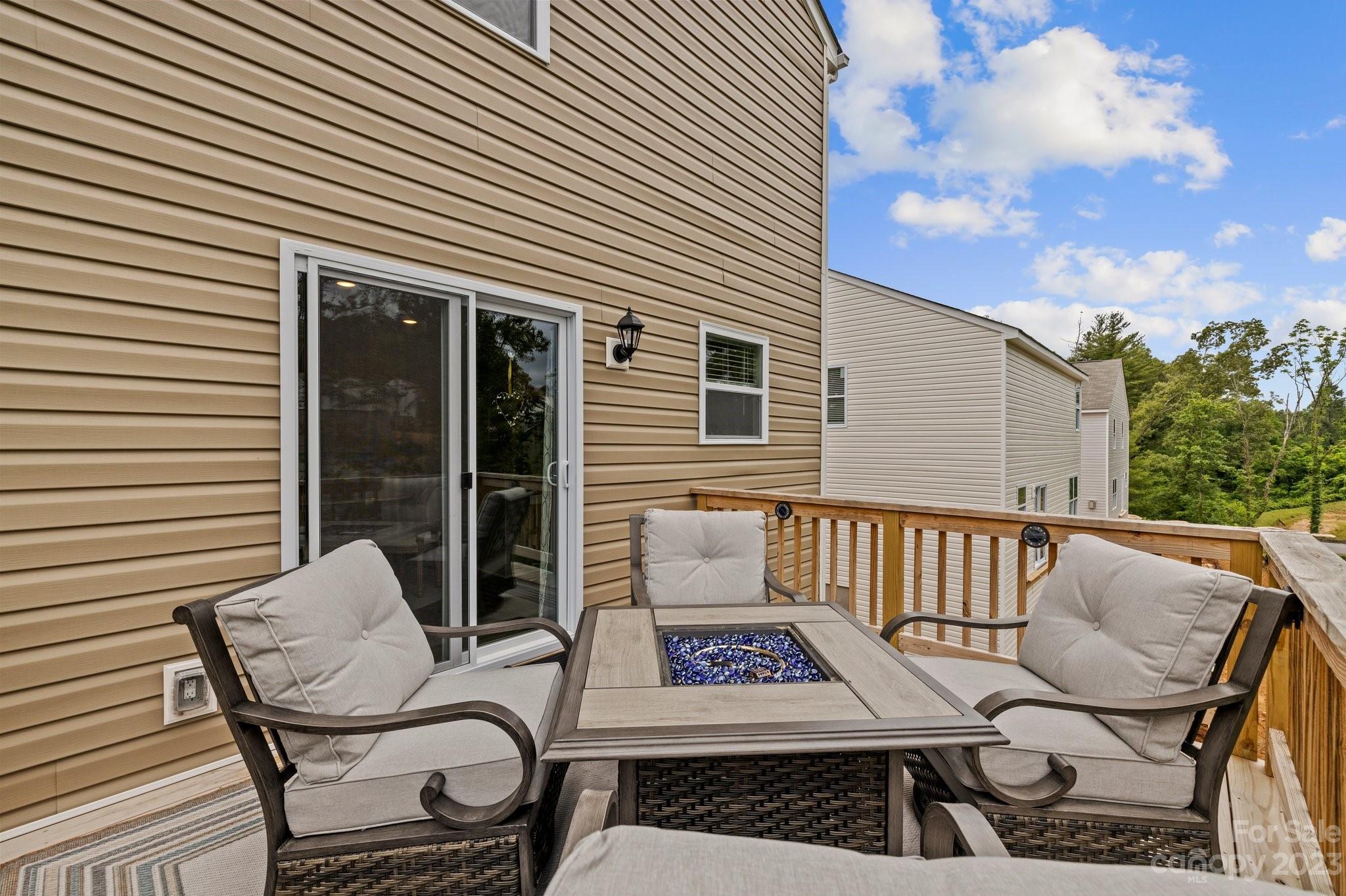 38 Hamrick Drive Candler, NC 28715 - Photo 35 of 37 a view of a two chairs in the back