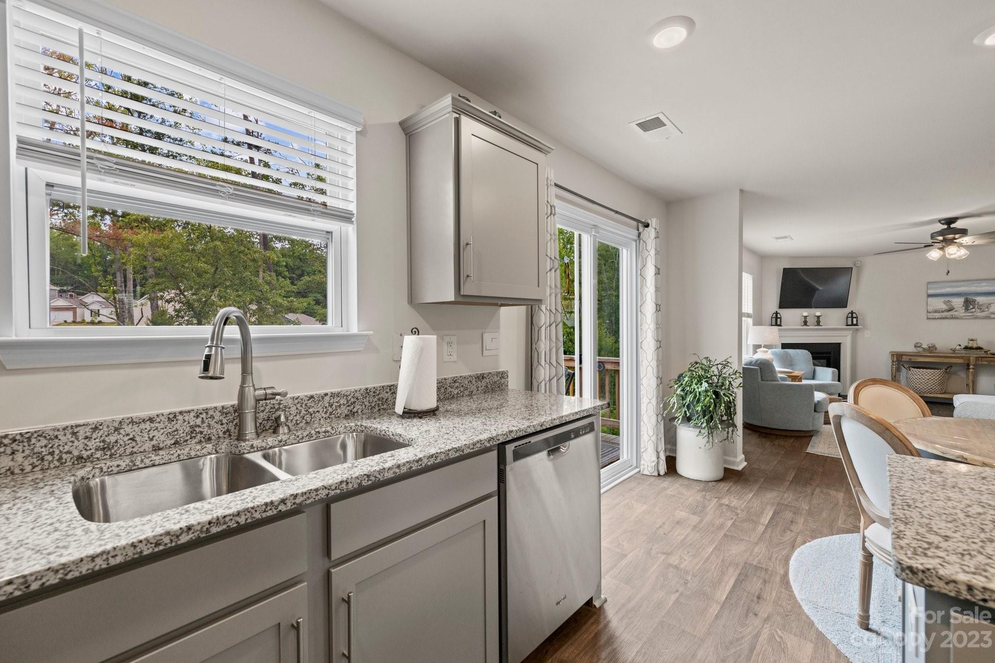 38 Hamrick Drive Candler, NC 28715 - Photo 6 of 37 a kitchen with a sink and a large window