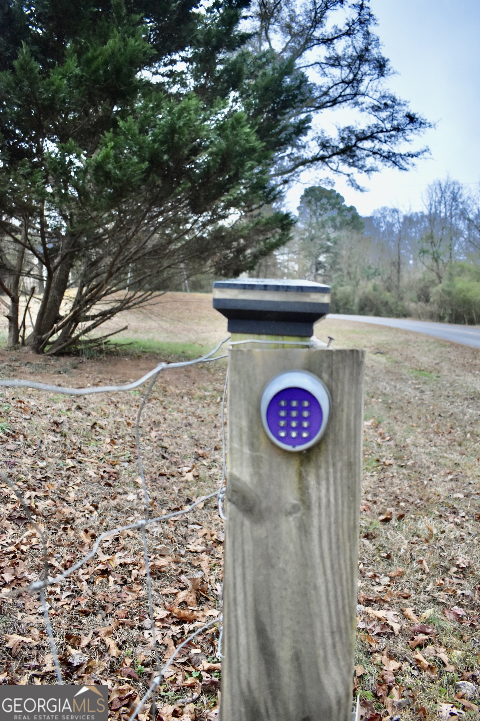 817 Brookside Drive Winder, GA 30680 - Photo 122 of 126 This is the key pad that is located on the main gate.