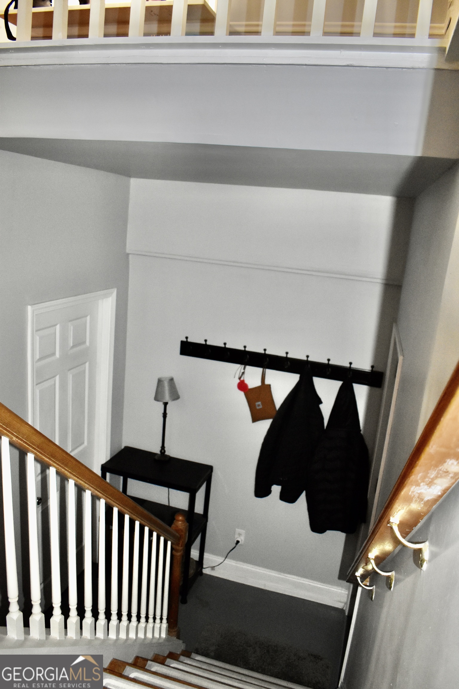 817 Brookside Drive Winder, GA 30680 - Photo 125 of 126 This mud room is located at the entrance from the garage to the home and is lcoated in between the stairs that go up to the main floor and the door that leads into the basement.