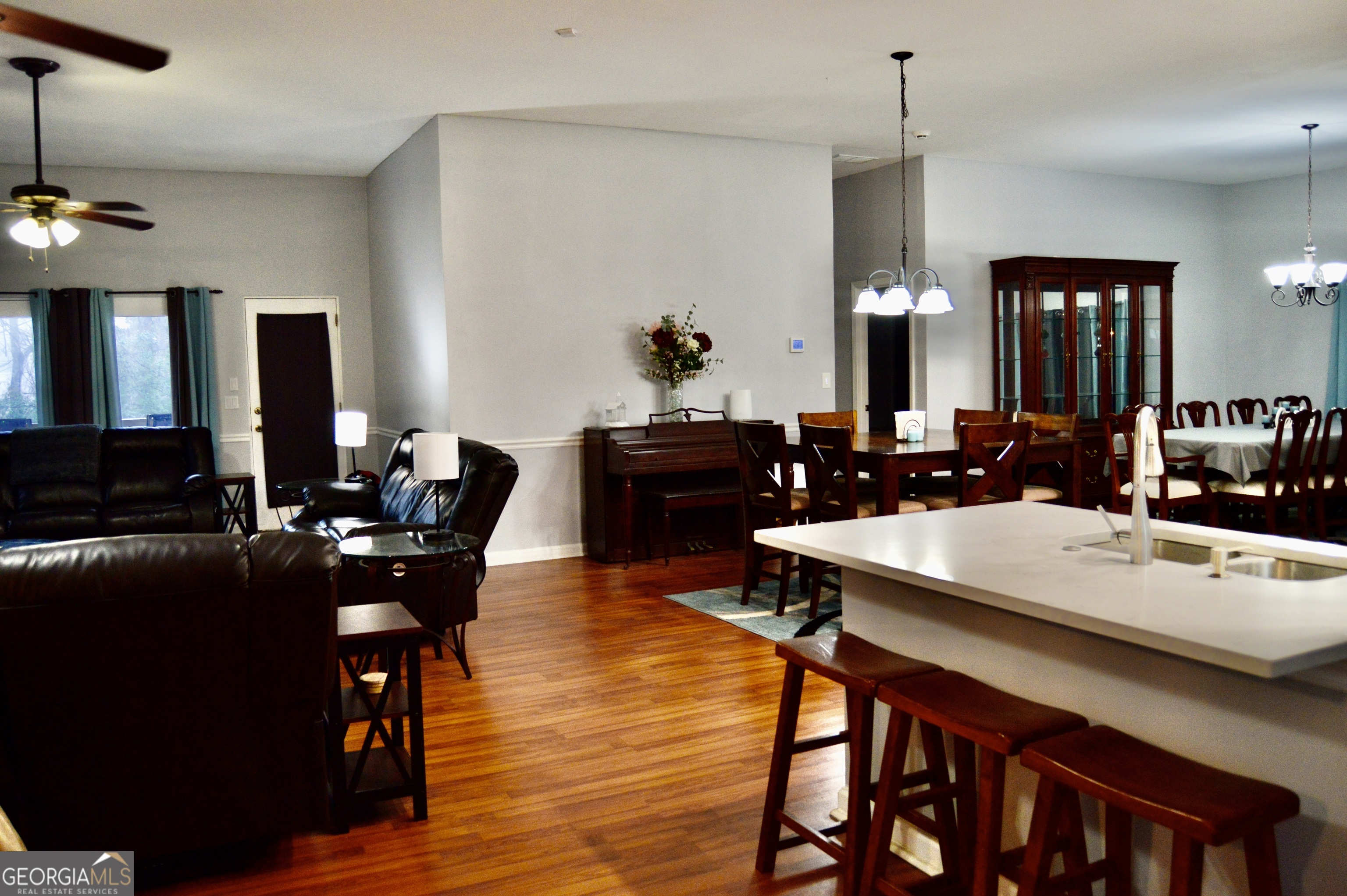 817 Brookside Drive Winder, GA 30680 - Photo 17 of 126 a view of a dining room with furniture and wooden floor