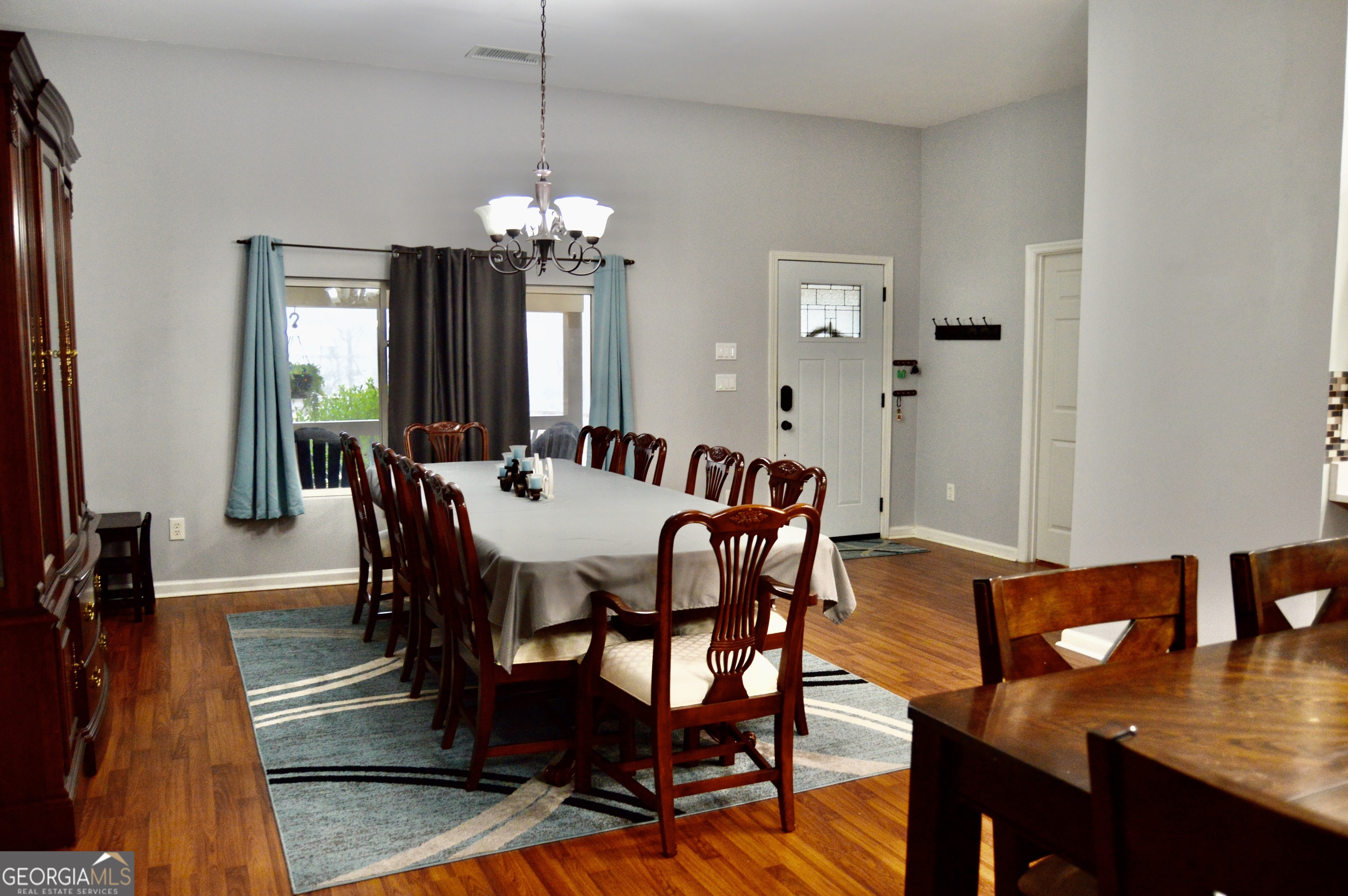 817 Brookside Drive Winder, GA 30680 - Photo 20 of 126 a view of a dining room with furniture and wooden floor