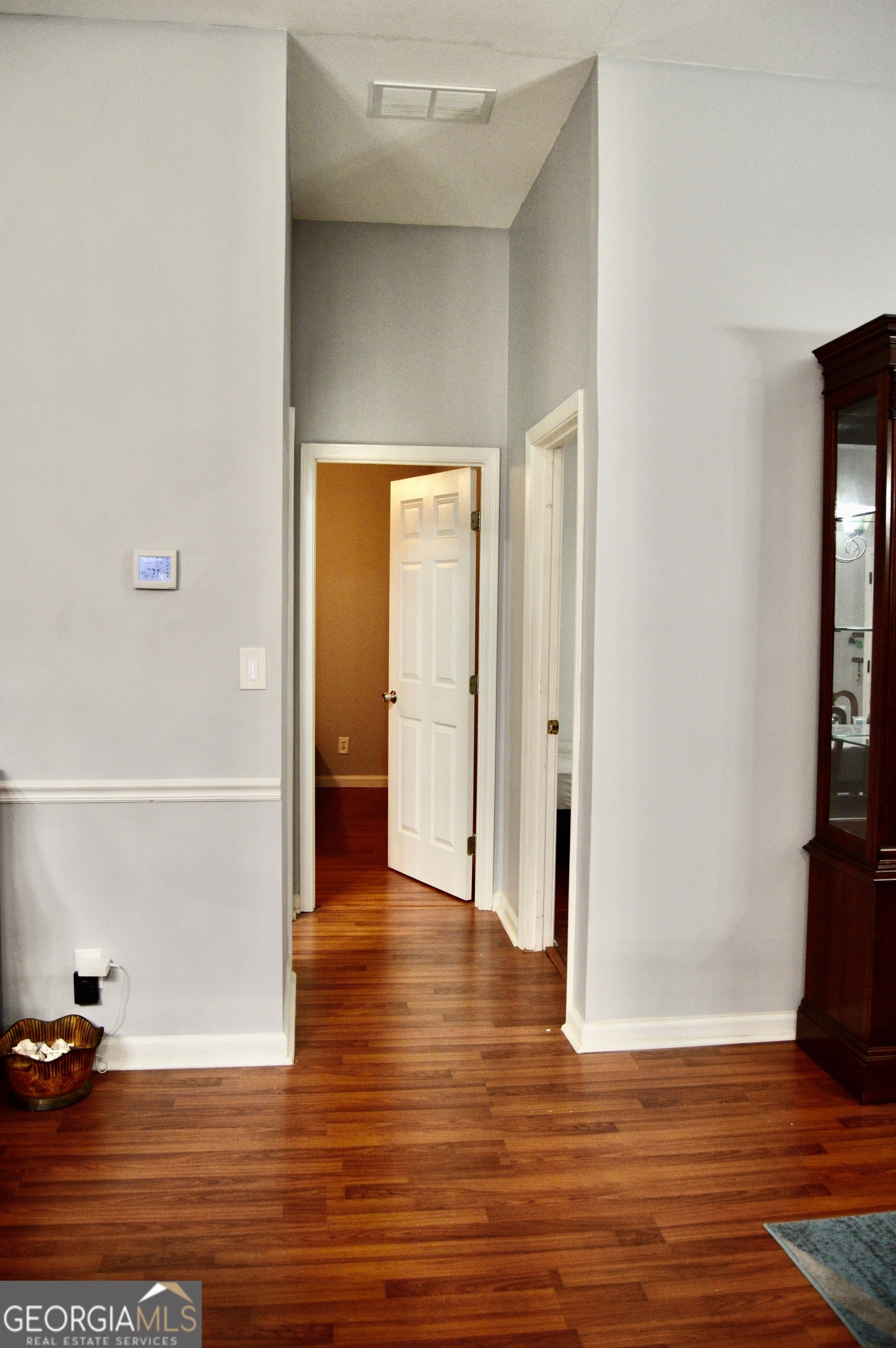 817 Brookside Drive Winder, GA 30680 - Photo 27 of 126 a view of a hallway with wooden floor and closet