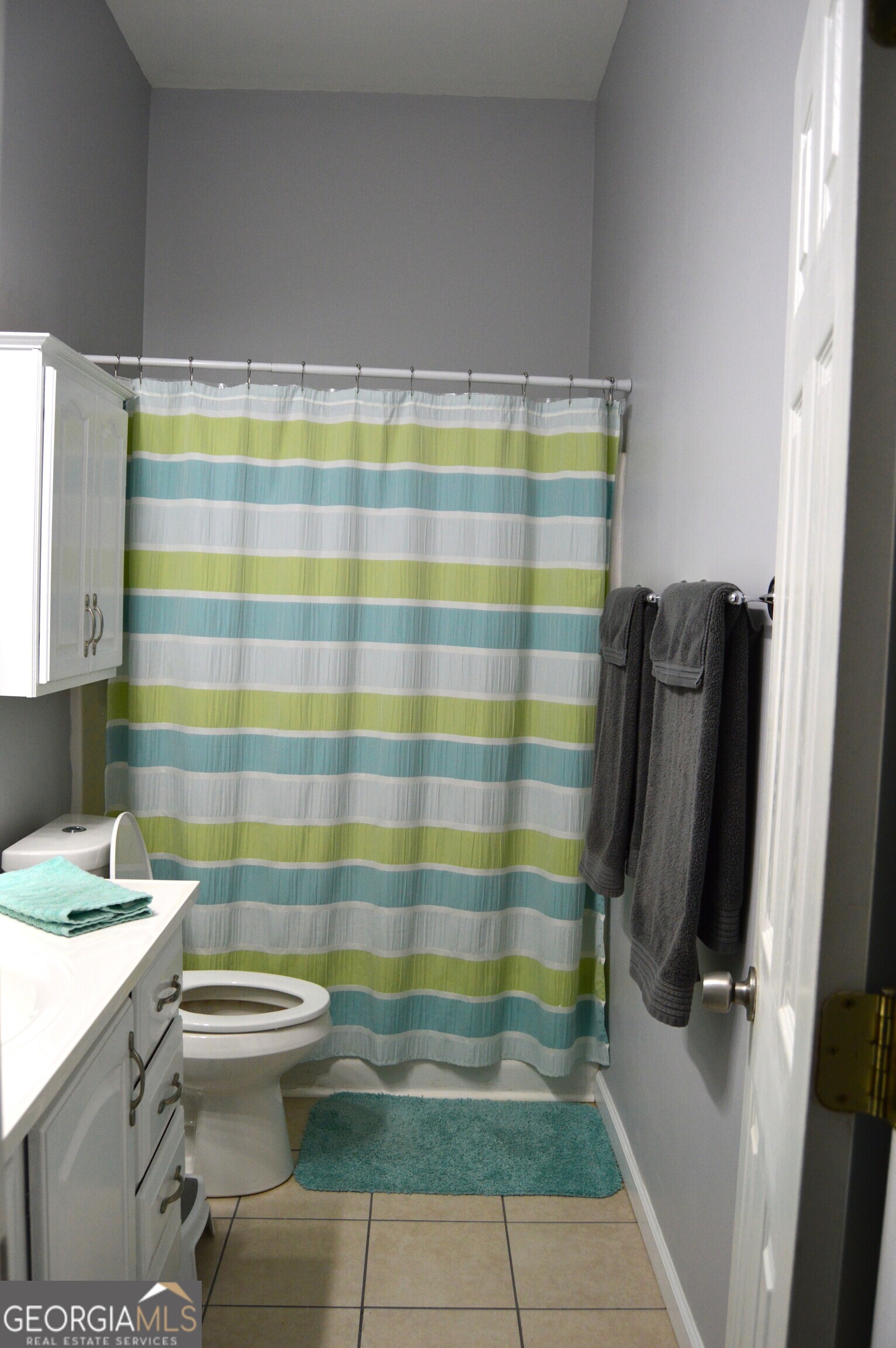 817 Brookside Drive Winder, GA 30680 - Photo 33 of 126 a bathroom with a sink a toilet and shower