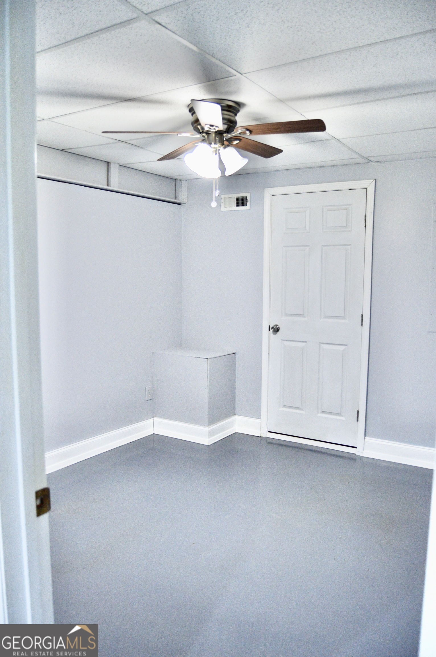817 Brookside Drive Winder, GA 30680 - Photo 79 of 126 a view of an empty room with a fan