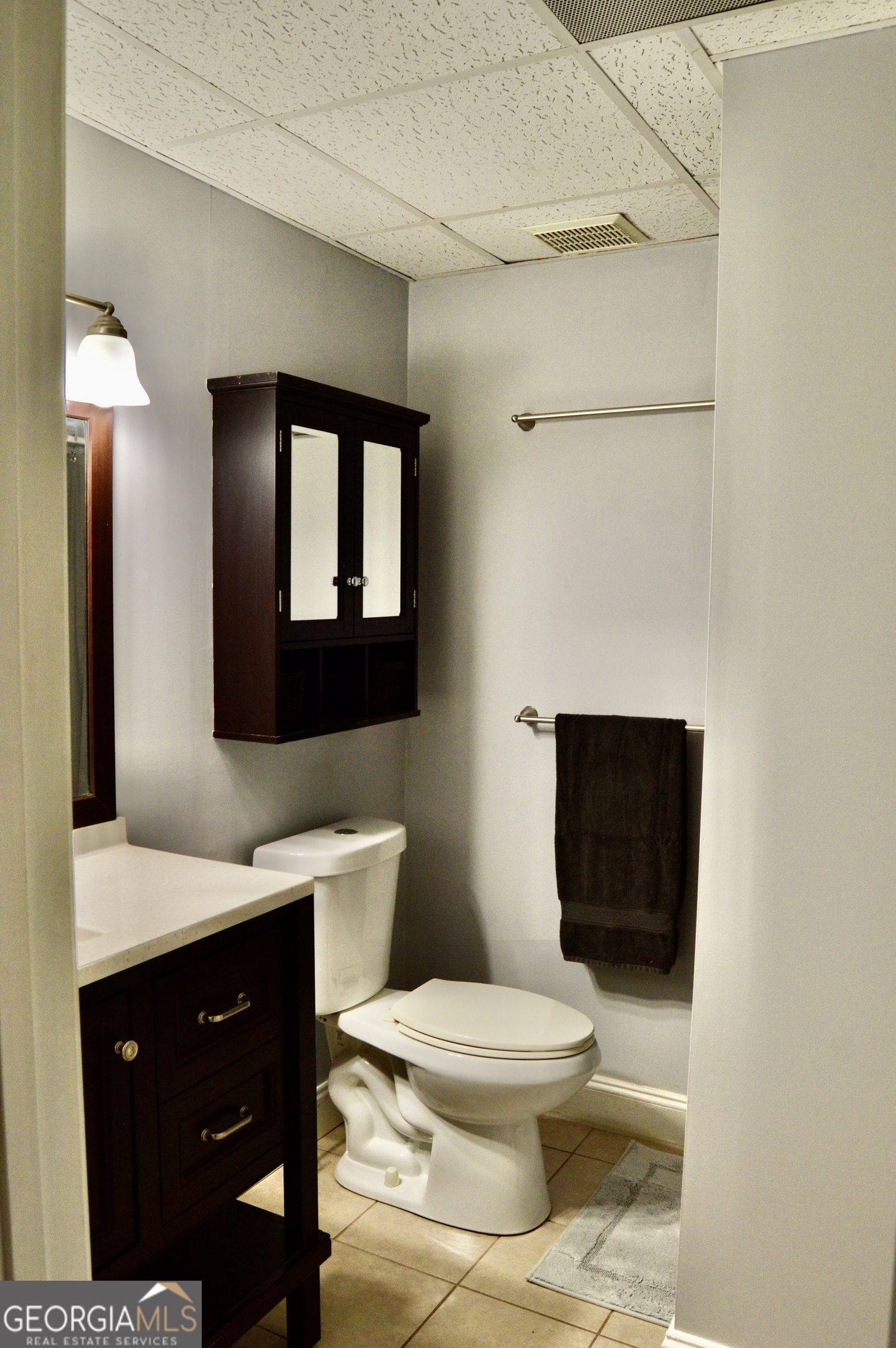 817 Brookside Drive Winder, GA 30680 - Photo 83 of 126 a bathroom with a toilet a sink and mirror