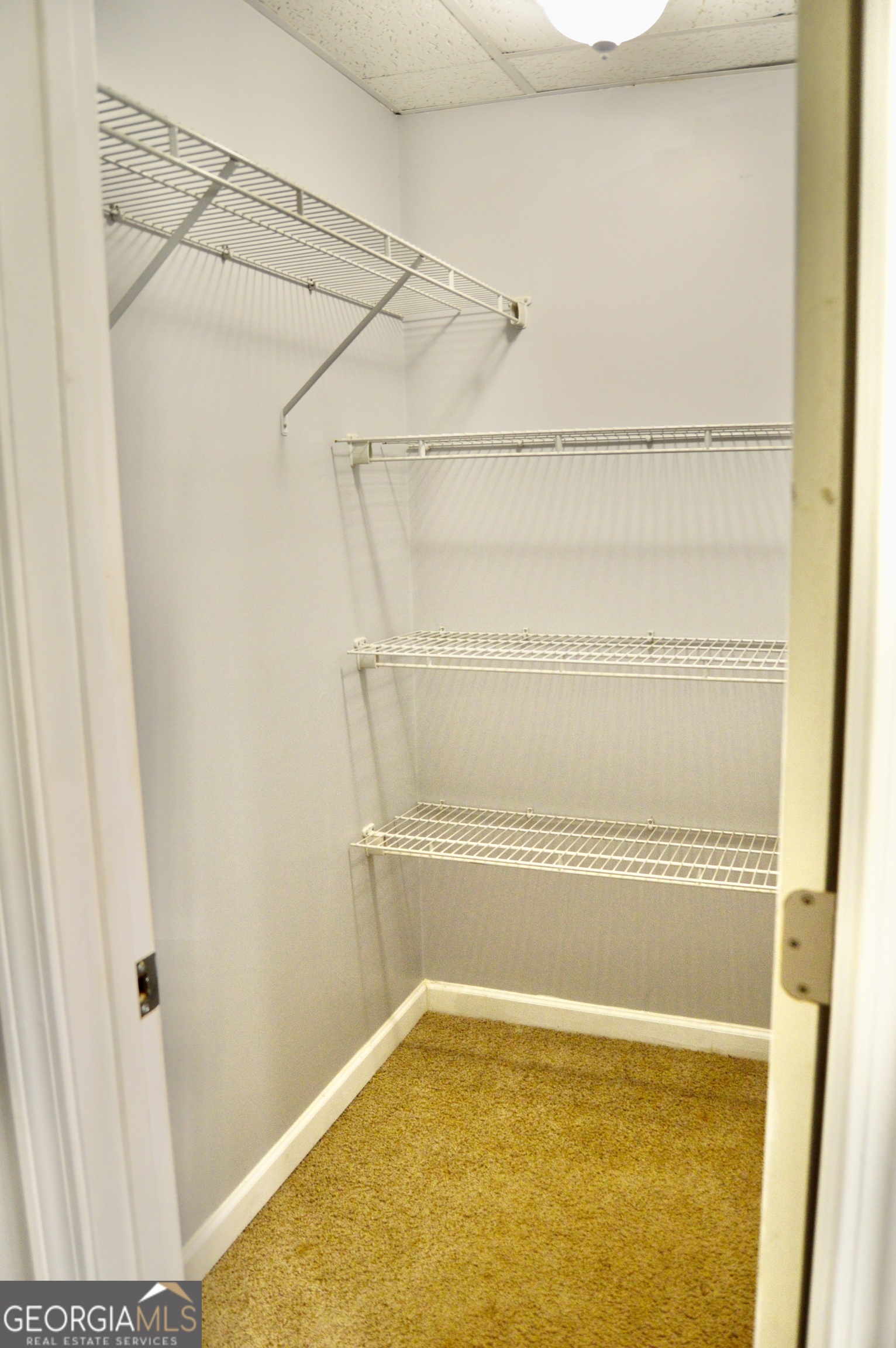 817 Brookside Drive Winder, GA 30680 - Photo 85 of 126 This is the walk in closet that is located inside bathroom 4.