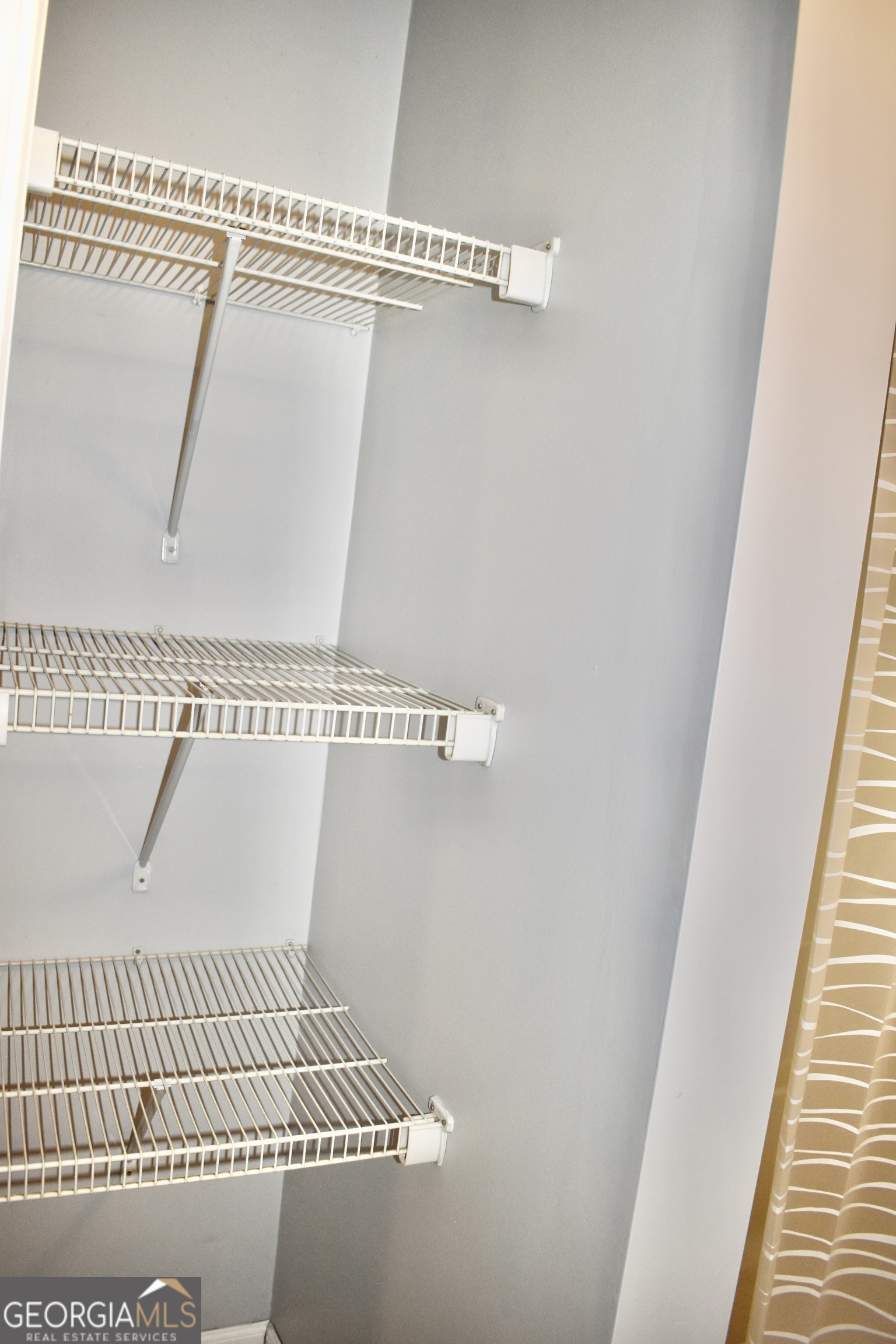 817 Brookside Drive Winder, GA 30680 - Photo 91 of 126 Extra shelving in the bathroom located next to the bathtub