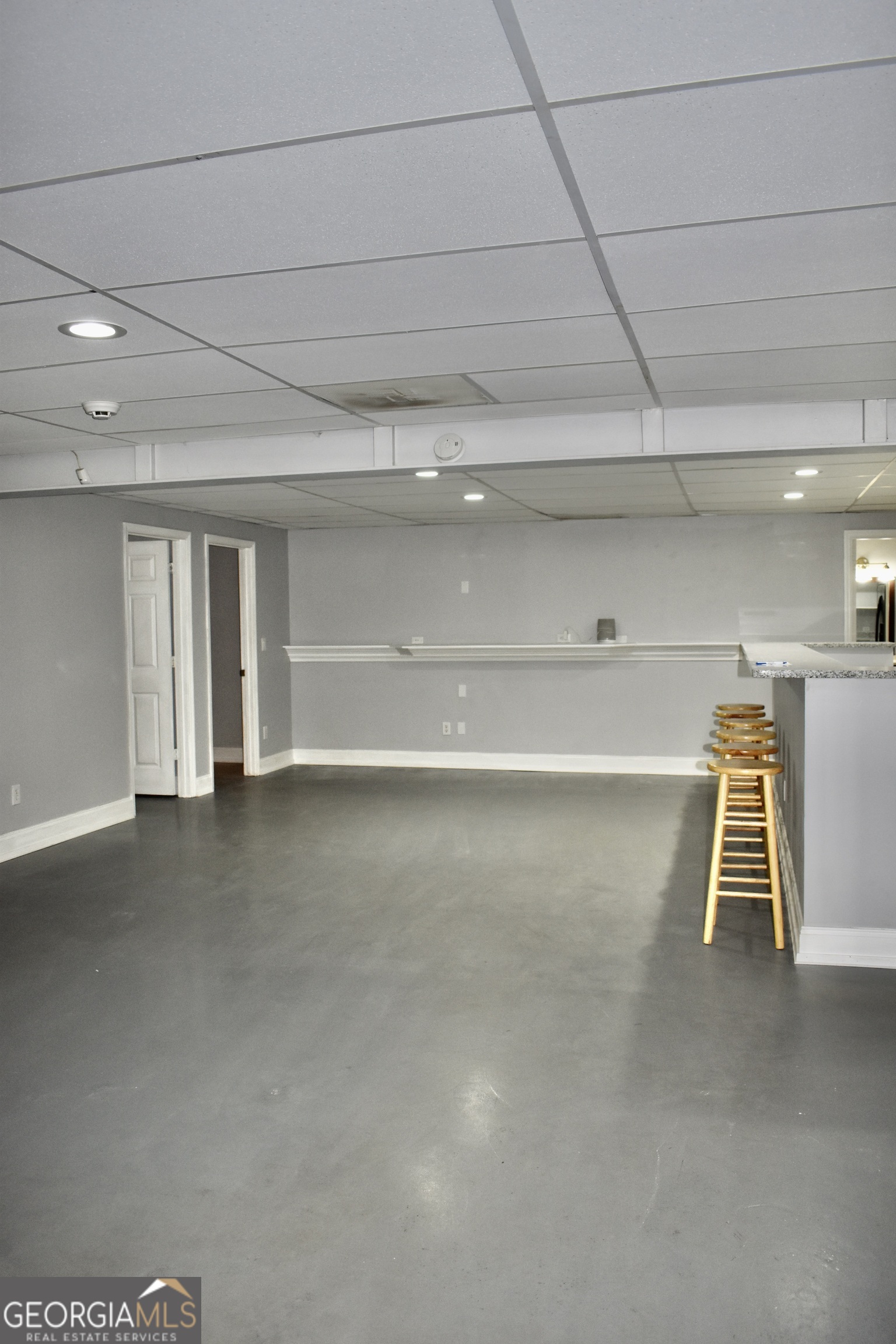 817 Brookside Drive Winder, GA 30680 - Photo 98 of 126 a view of a room with table and chairs