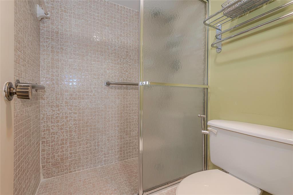 1200 St Charles Place, Unit L19 Pembroke Pines, FL 33026 - Photo 20 of 26 a bathroom with a toilet and a shower