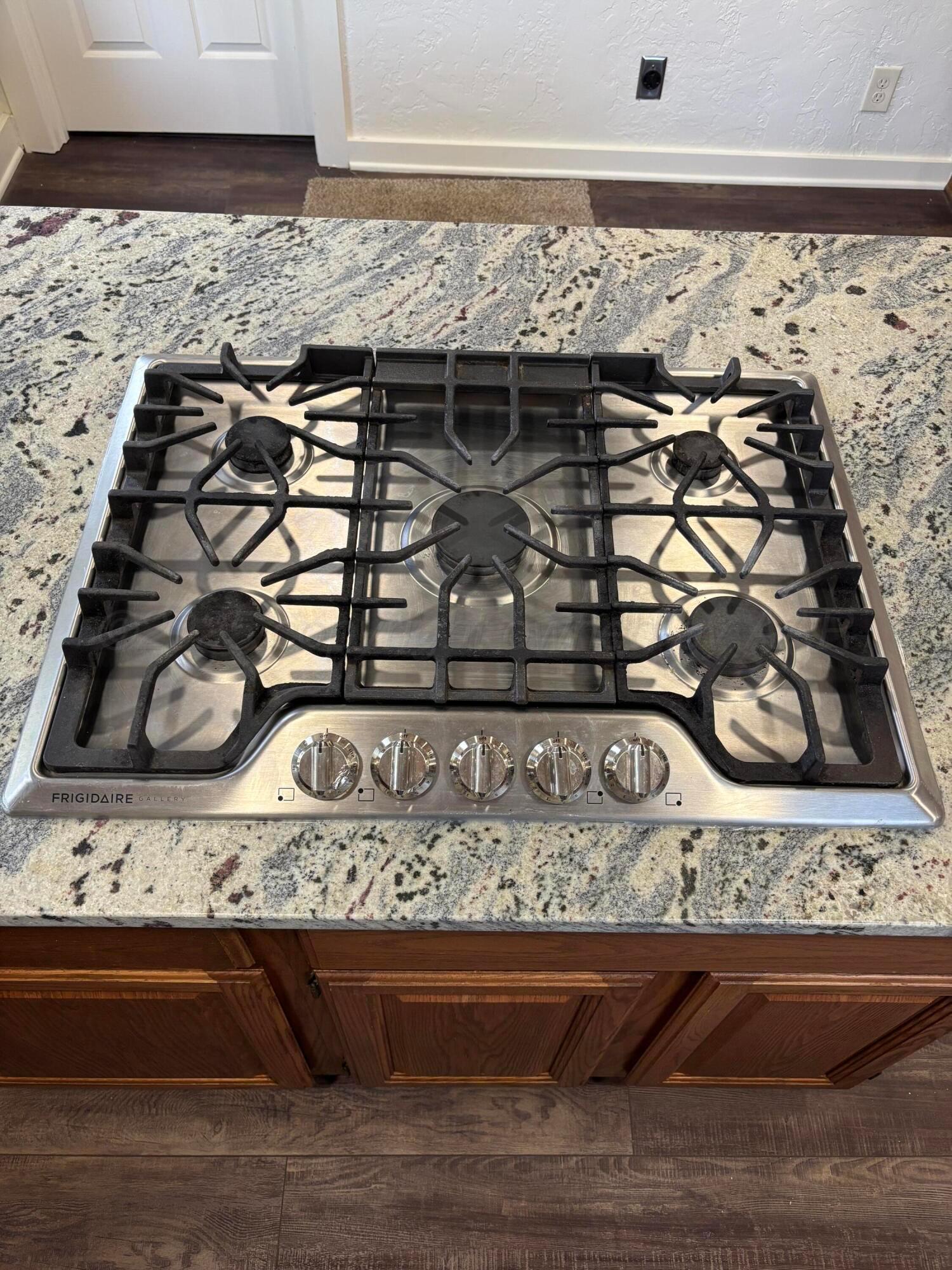 214 East Wichita Street Miami, TX 79059 - Photo 14 of 18 a close view of a stove