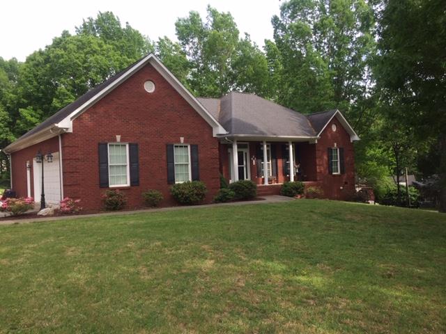 1109 Loftin Road Columbia, TN 38401 - Photo 1 of 18 a front view of a house with a yard