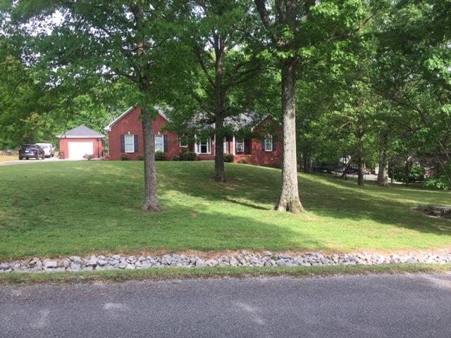 1109 Loftin Road Columbia, TN 38401 - Photo 2 of 18 a yellow house with a big yard and large trees