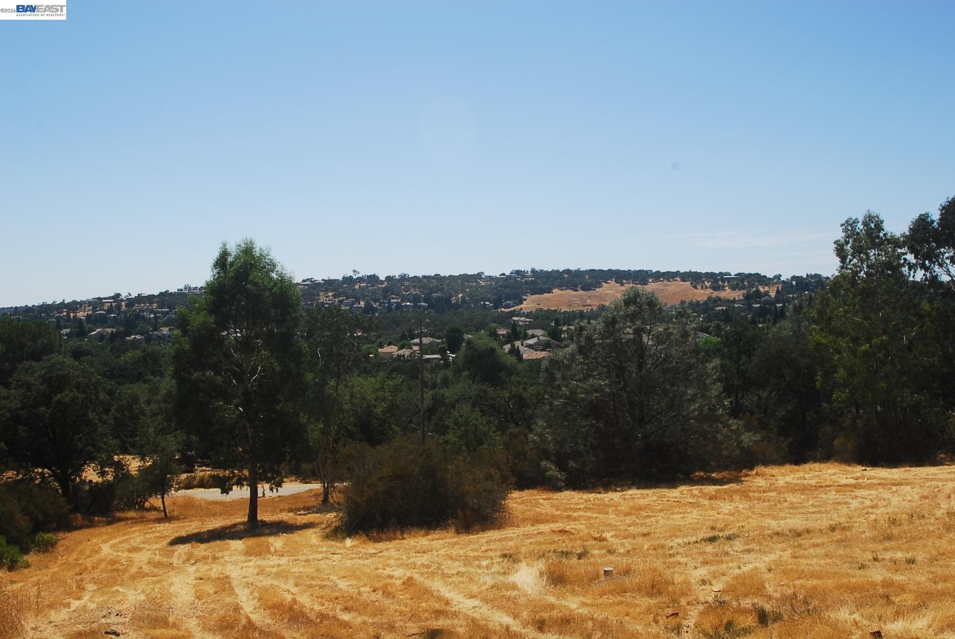 3341 Rancho Tierra Court Cameron Park, CA 95682 - Photo 6 of 28 a view of a lake with a mountain