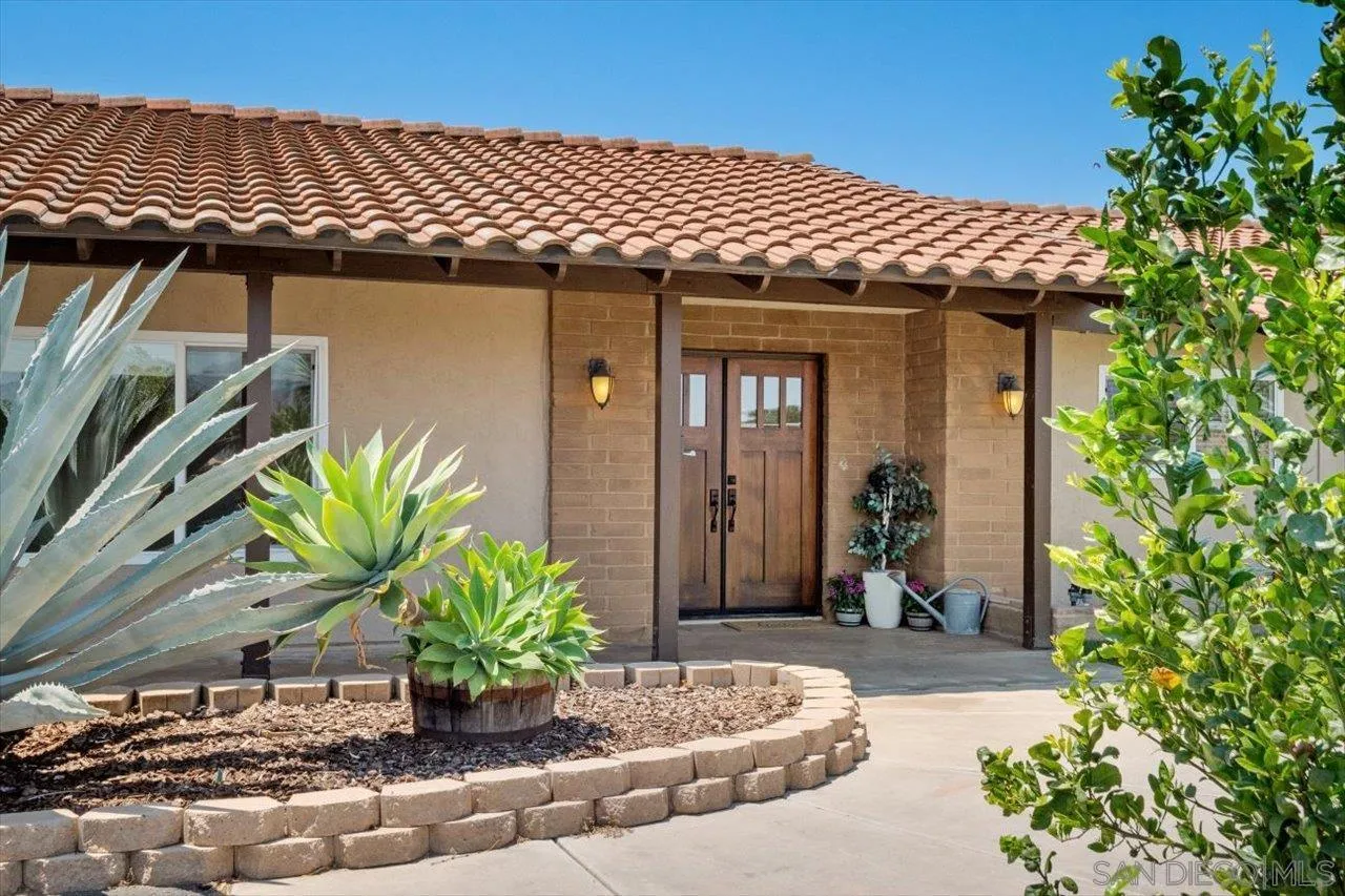 32251 Cole Grade Road Valley Center, CA 92082 - Photo 1 of 54 a front view of a house