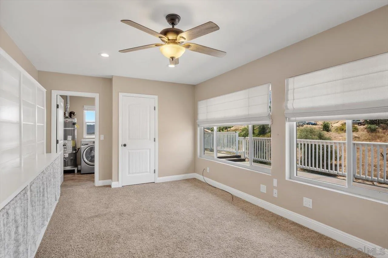 32251 Cole Grade Road Valley Center, CA 92082 - Photo 15 of 54 wooden floor in an empty room with a window