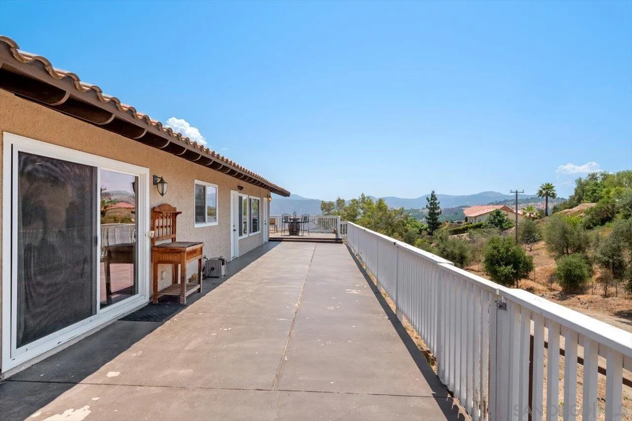 32251 Cole Grade Road Valley Center, CA 92082 - Photo 17 of 54 a view of a house with roof deck
