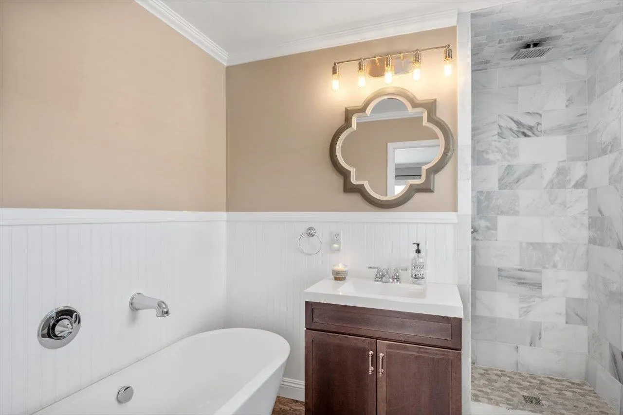 32251 Cole Grade Road Valley Center, CA 92082 - Photo 21 of 54 a bathroom with a sink mirror and toilet