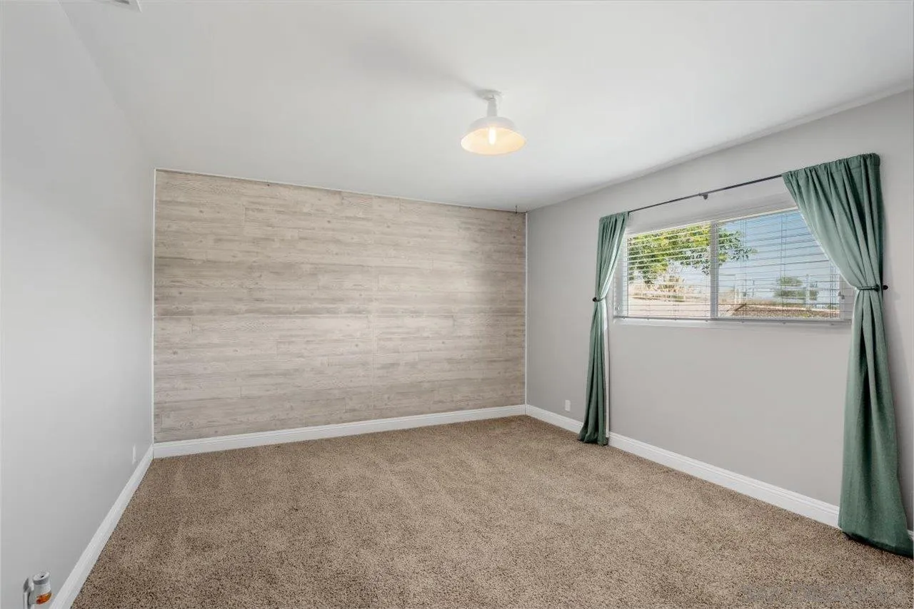 32251 Cole Grade Road Valley Center, CA 92082 - Photo 23 of 54 an empty room with windows