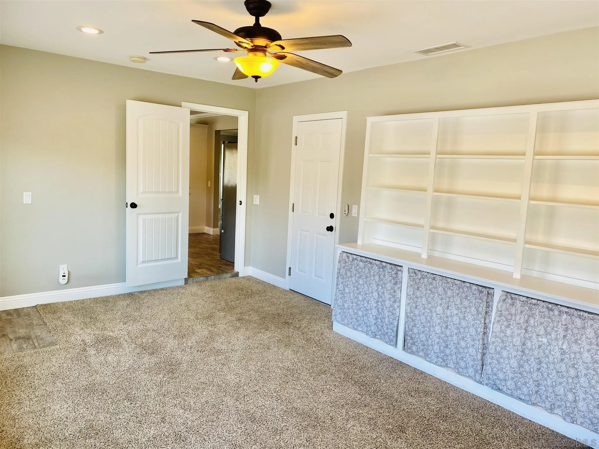 32251 Cole Grade Road Valley Center, CA 92082 - Photo 25 of 54 wooden floor in an empty room with a window