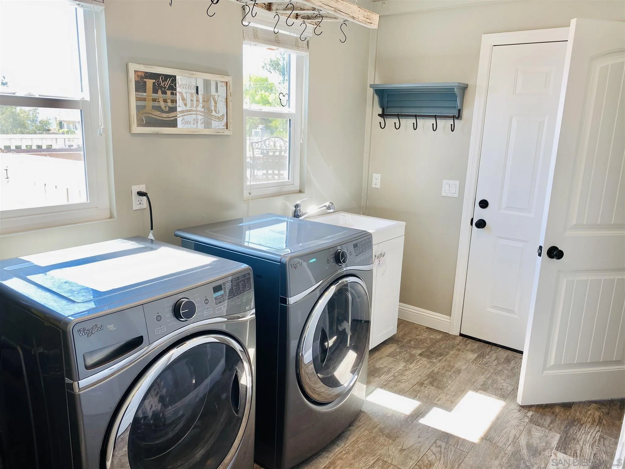 32251 Cole Grade Road Valley Center, CA 92082 - Photo 27 of 54 a utility room with dryer and washer