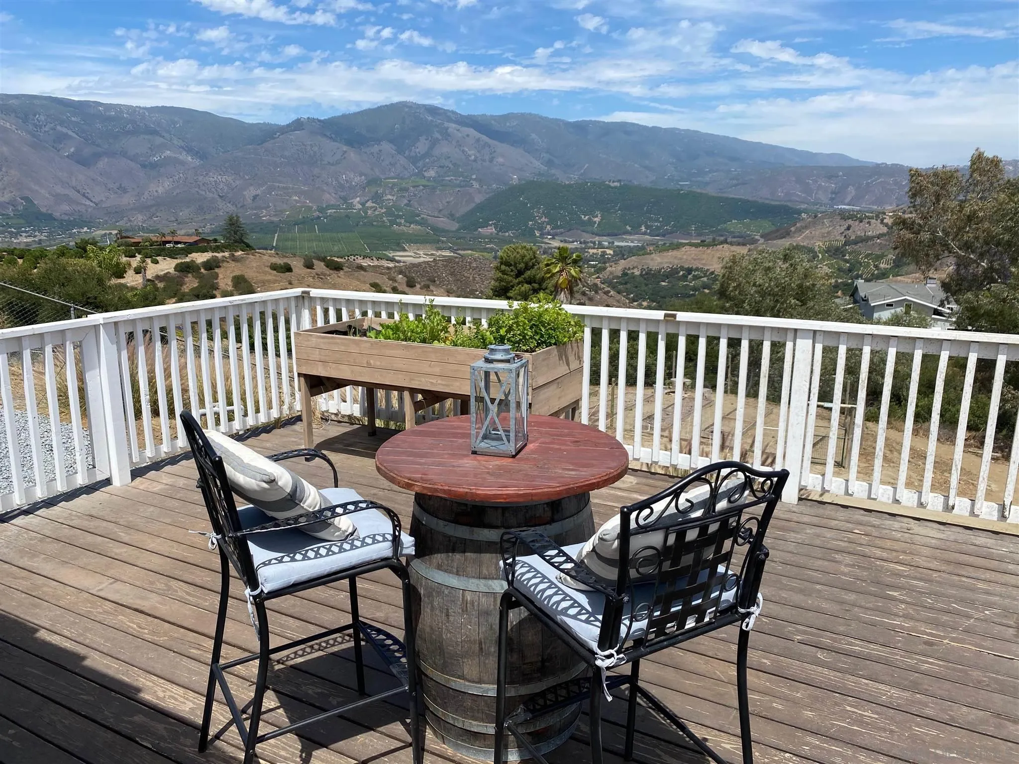 32251 Cole Grade Road Valley Center, CA 92082 - Photo 31 of 54 a view of a chairs and table on the deck