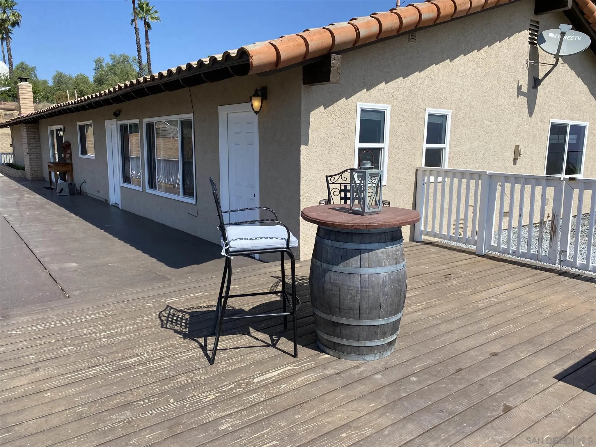 32251 Cole Grade Road Valley Center, CA 92082 - Photo 33 of 54 a view of a house with backyard and sitting area