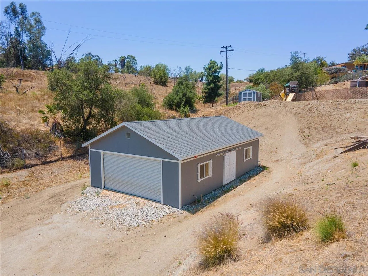 32251 Cole Grade Road Valley Center, CA 92082 - Photo 45 of 54 a big yard with large trees