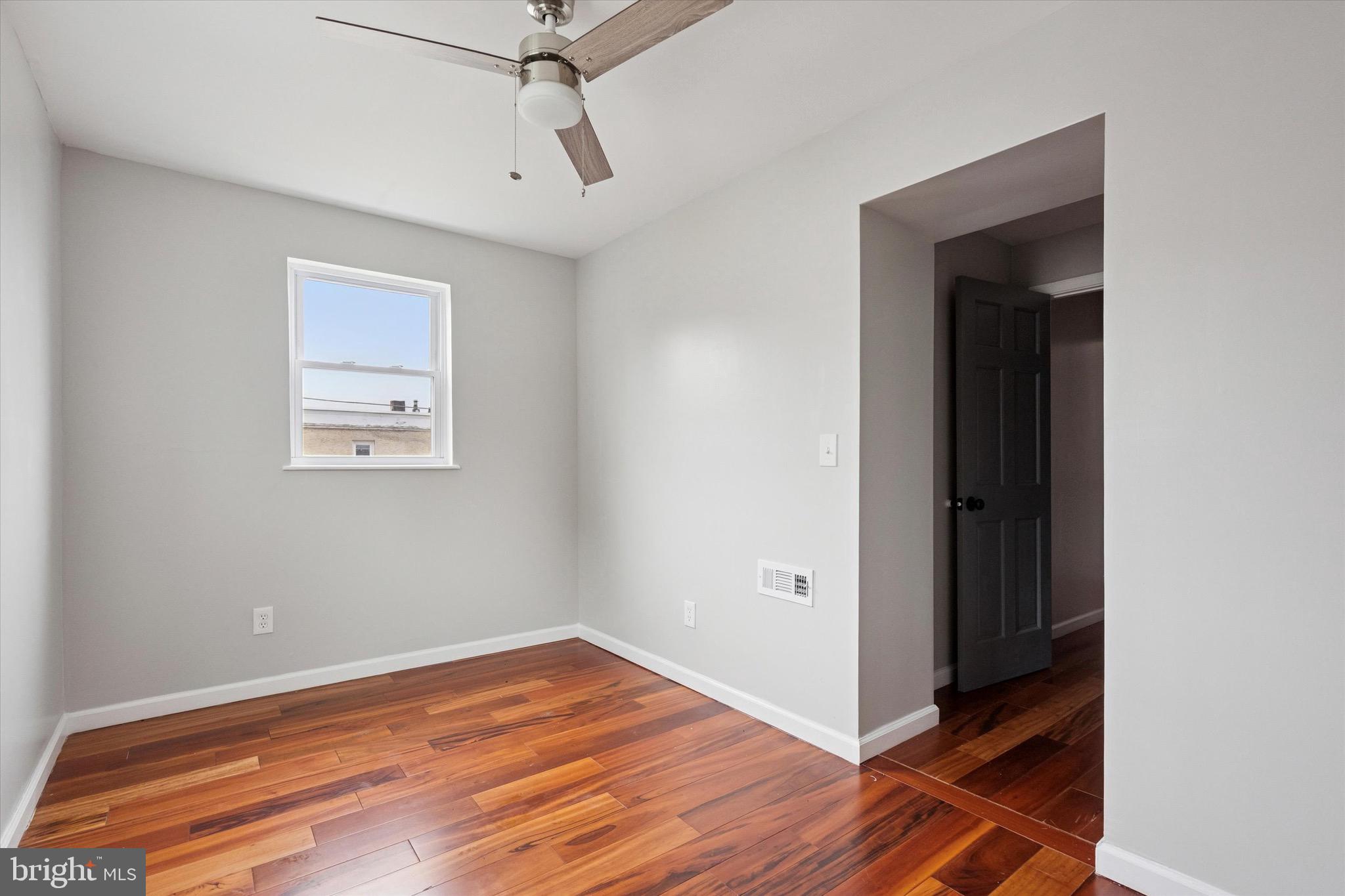 213 East Phil Ellena Street Philadelphia, PA 19119 - Photo 18 of 28 a view of a room with wooden floor and closet