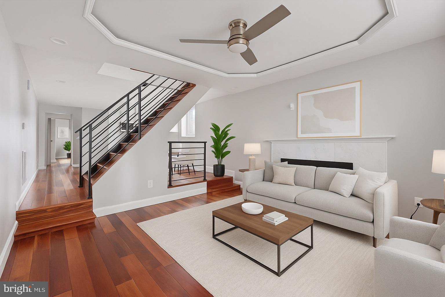 213 East Phil Ellena Street Philadelphia, PA 19119 - Photo 2 of 28 a living room with furniture and a wooden floor