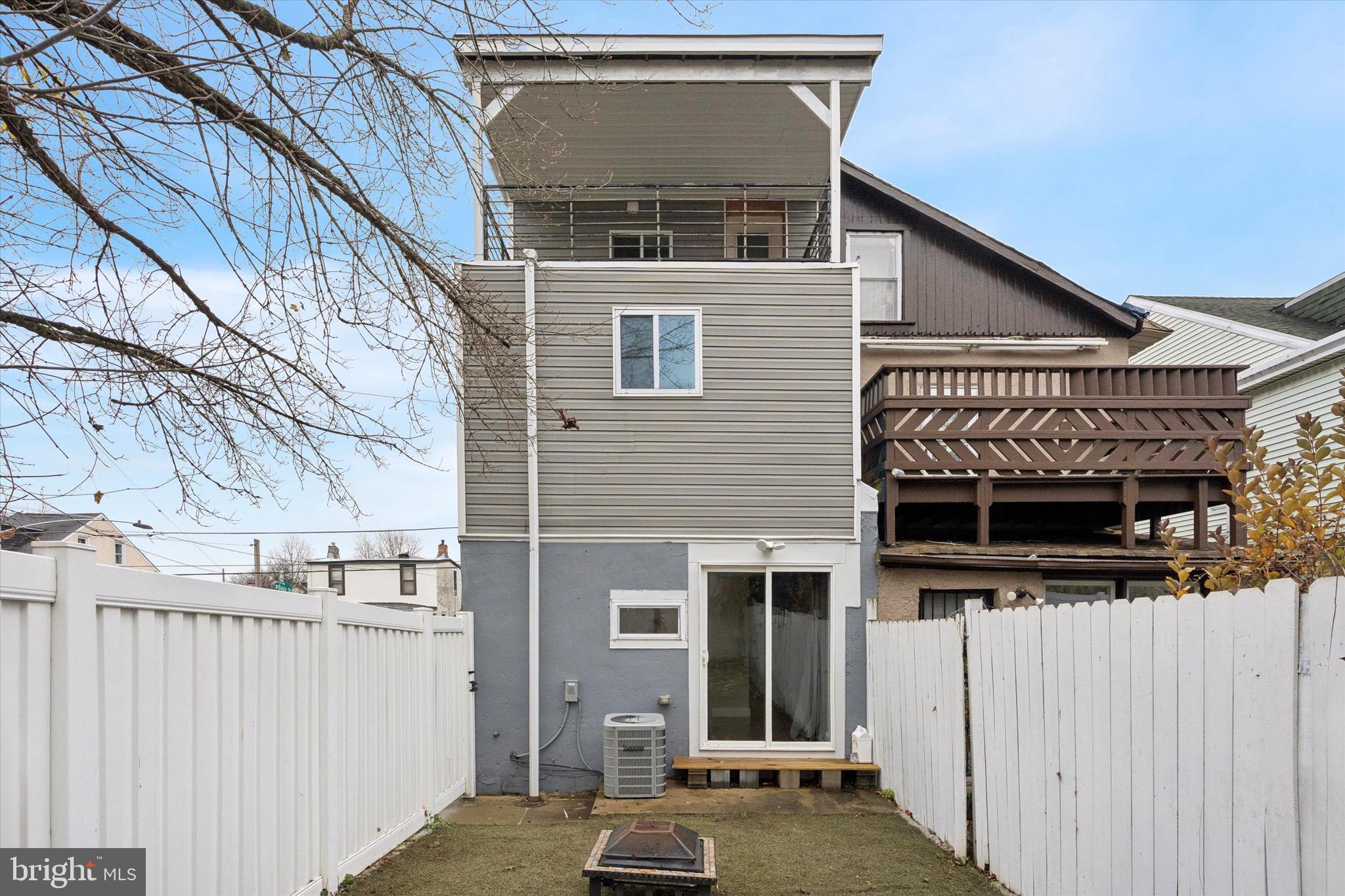 213 East Phil Ellena Street Philadelphia, PA 19119 - Photo 27 of 28 a view of a house with a balcony
