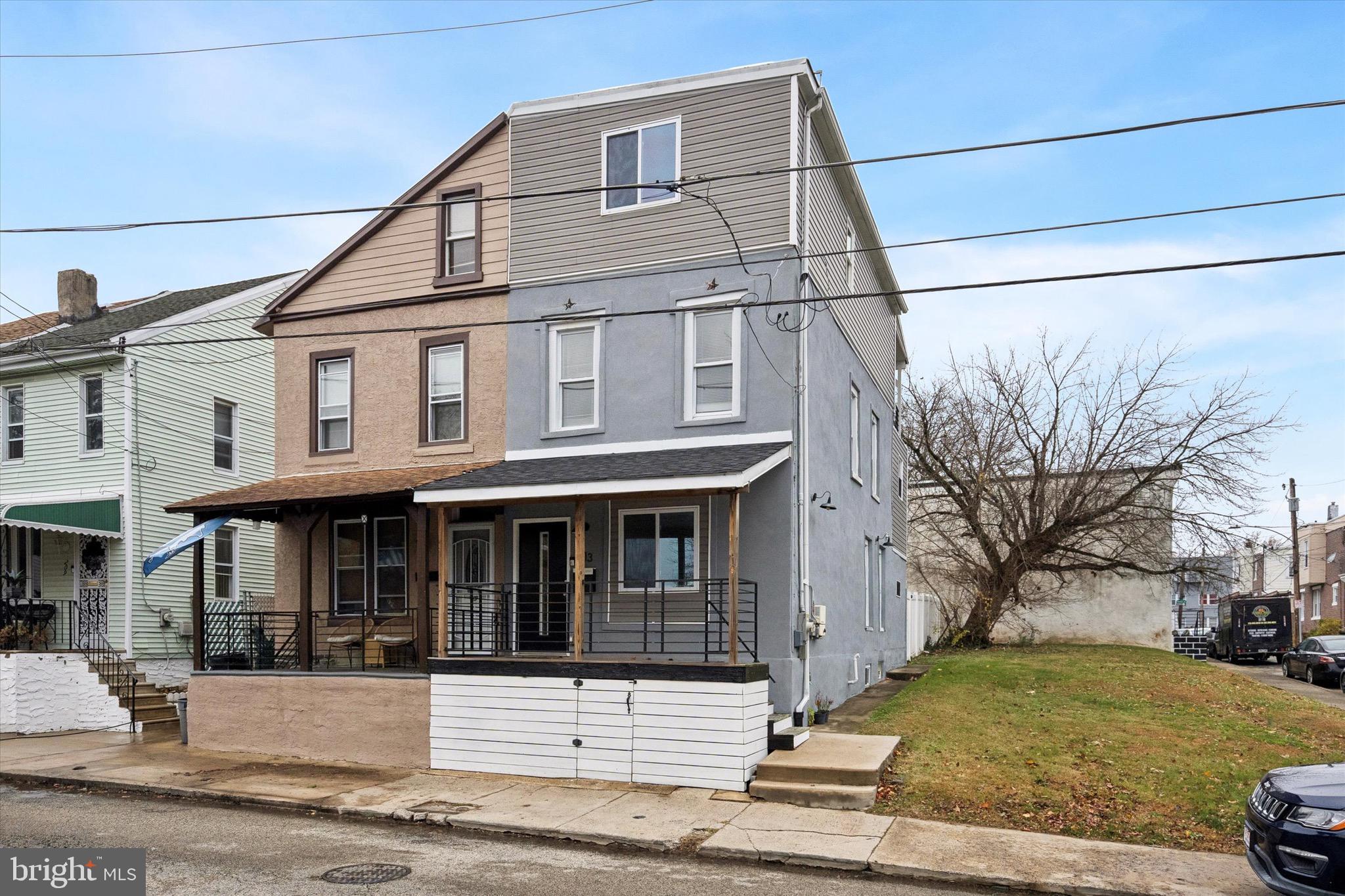 213 East Phil Ellena Street Philadelphia, PA 19119 - Photo 28 of 28 a front view of a house with a yard