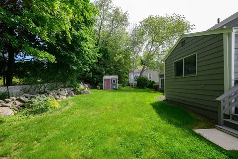 a view of a backyard with a garden