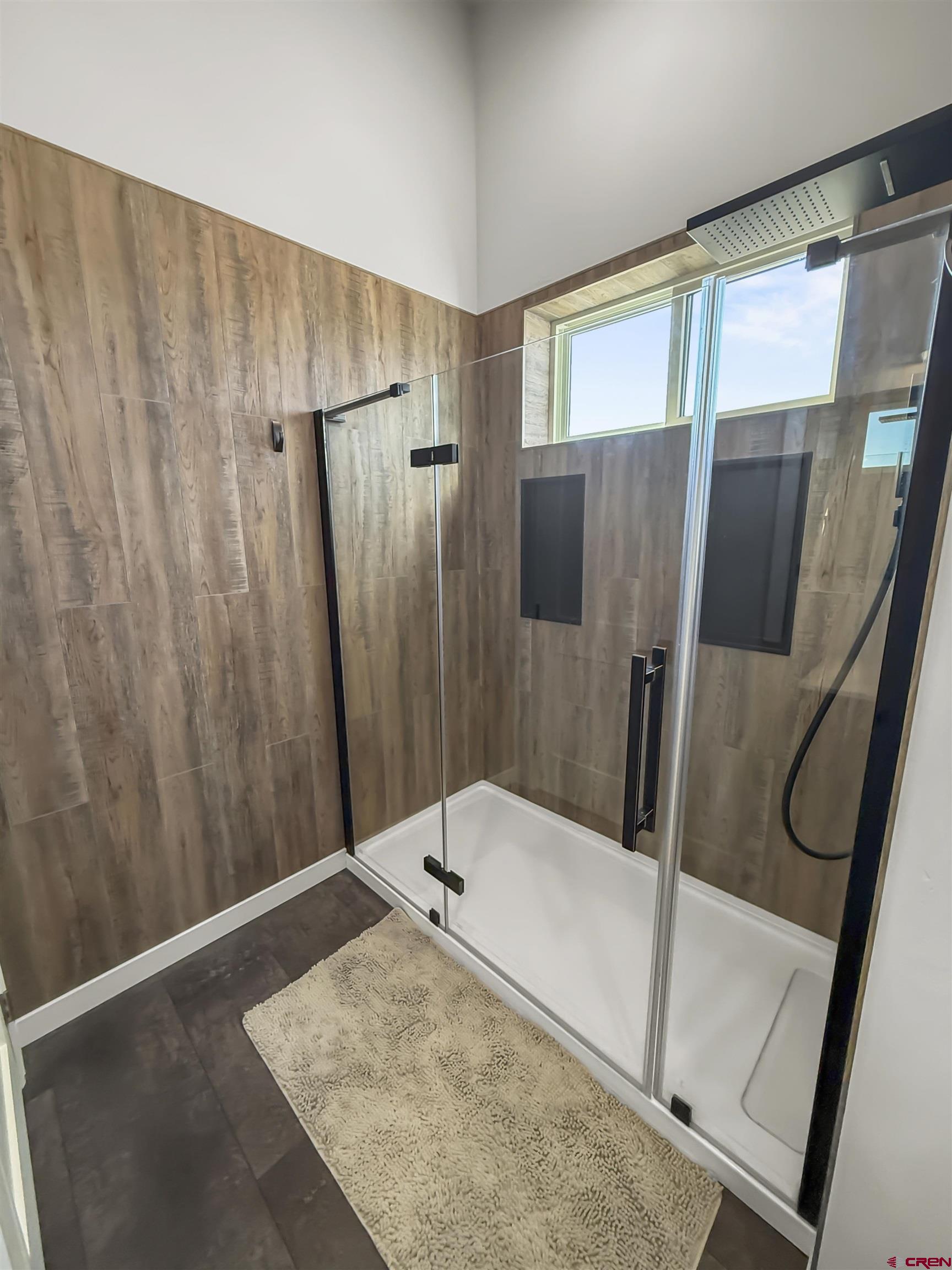 70848 Buckhorn Road Montrose, CO 81403 - Photo 38 of 43 a bathroom with a shower and a tub