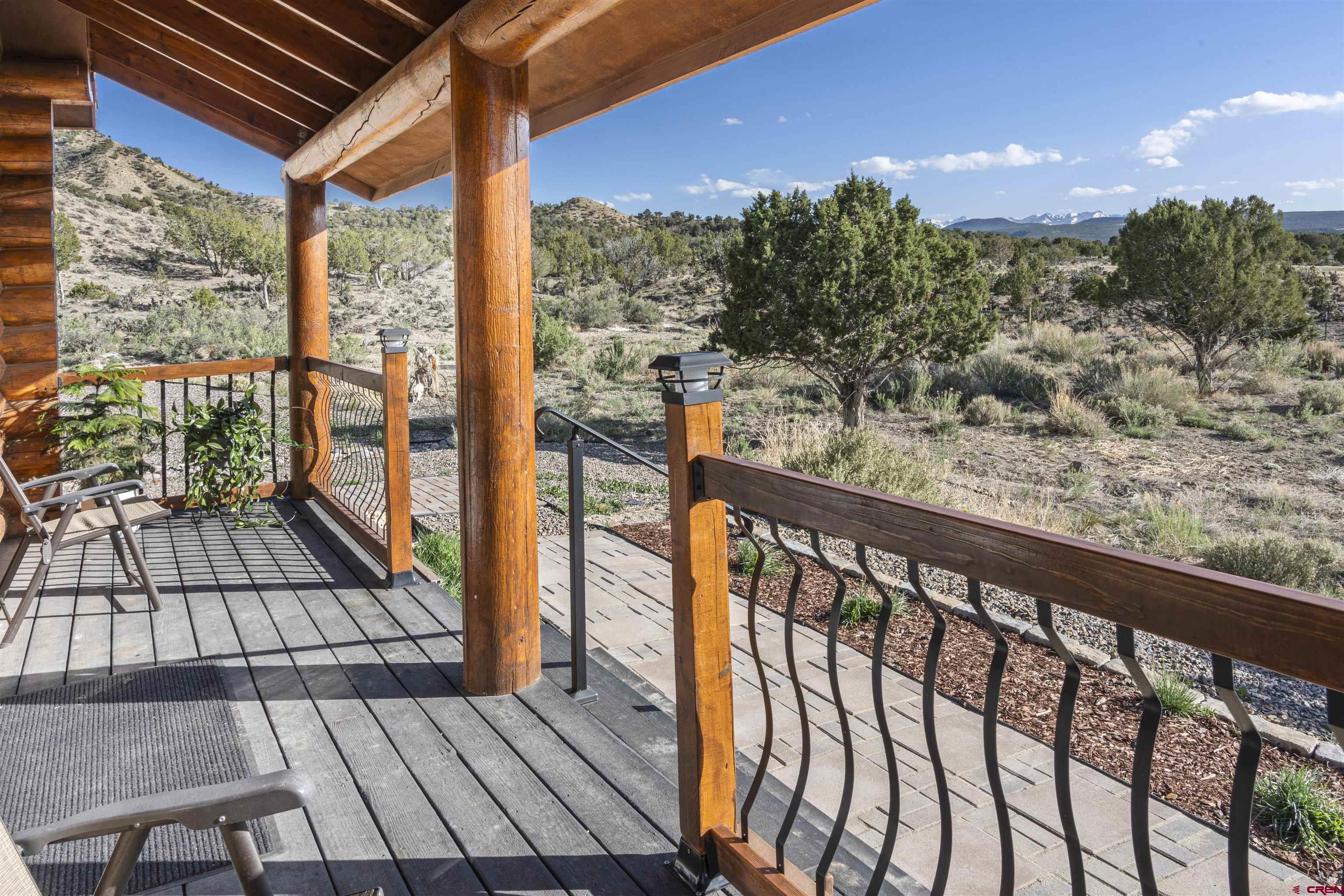70848 Buckhorn Road Montrose, CO 81403 - Photo 41 of 43 a view of a balcony with wooden floor