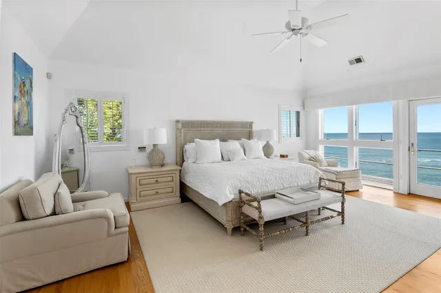 a bed room with a bed and a couch