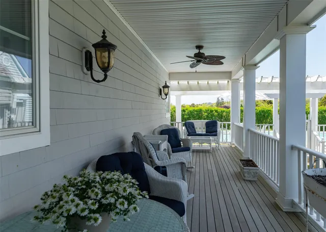 a view of balcony with furniture