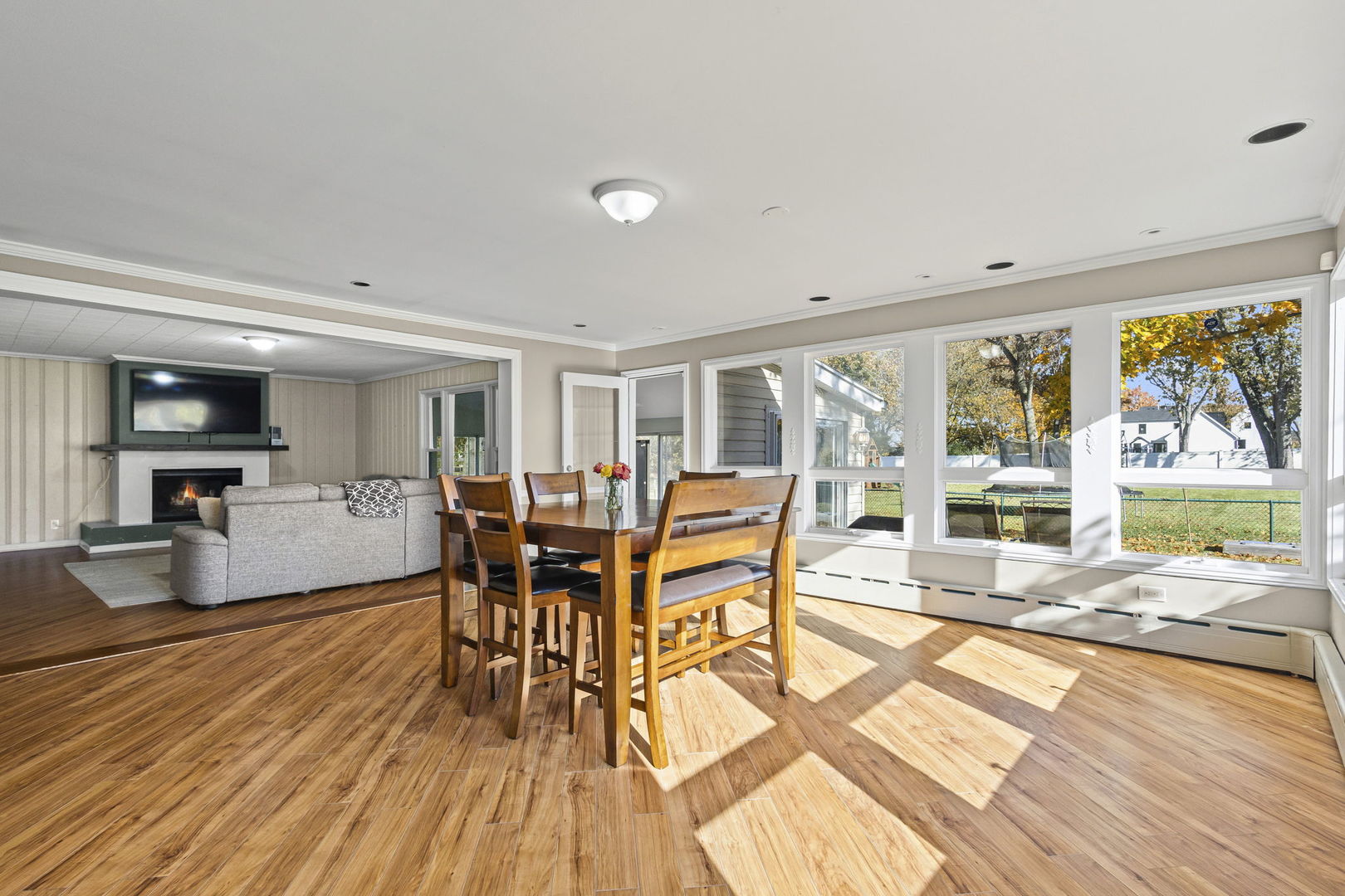1615 Greenwood Road Glenview, IL 60026 - Photo 12 of 41 a view of a dining room with furniture window and wooden floor