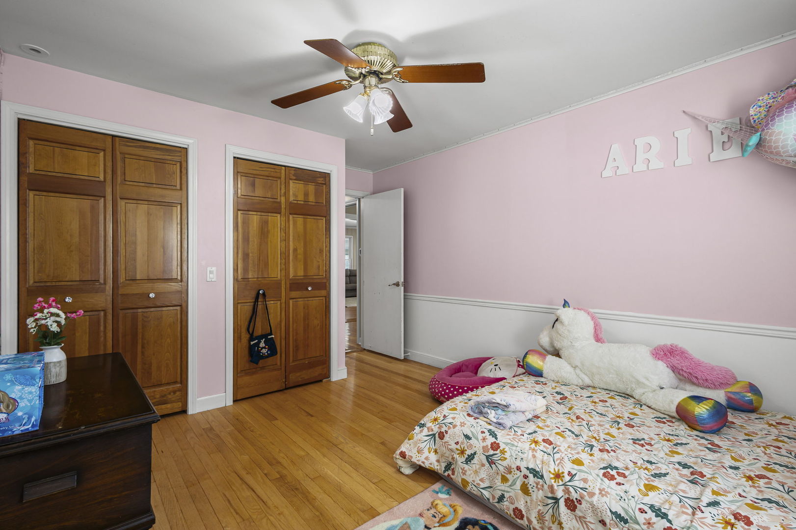 1615 Greenwood Road Glenview, IL 60026 - Photo 20 of 41 a bedroom that has a bed and a chandelier in it