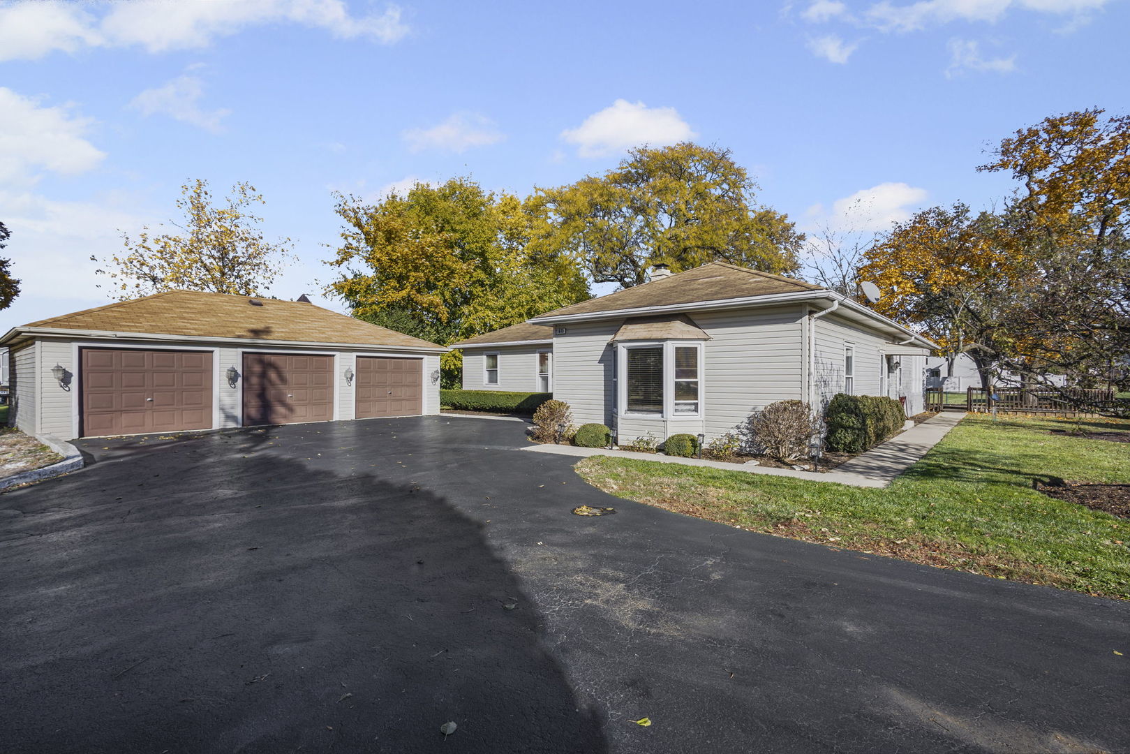 1615 Greenwood Road Glenview, IL 60026 - Photo 31 of 41 a front view of a house with a garden and yard