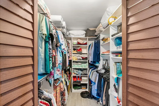 a reading room with furniture and a window