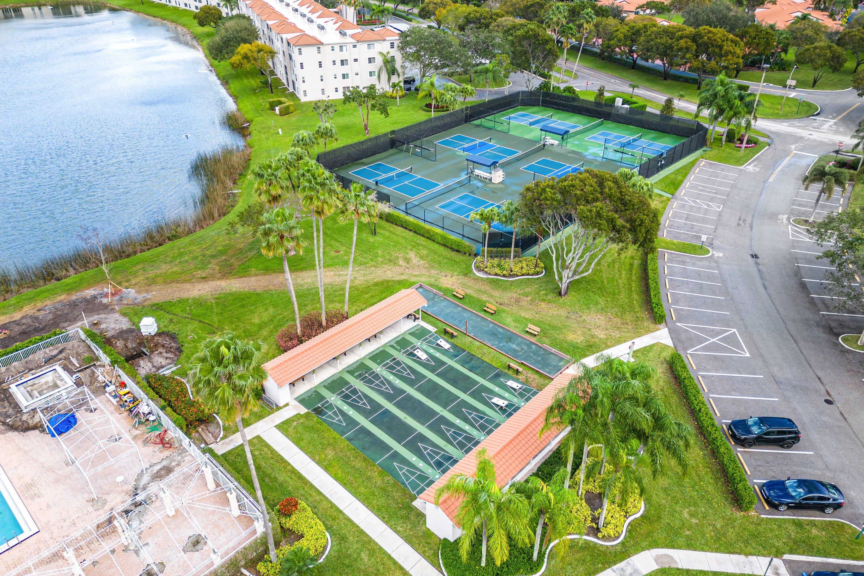 6149 Pointe Regal Circle, Unit 108 Delray Beach, FL 33484 - Photo 49 of 56 Tennis + Pickelball