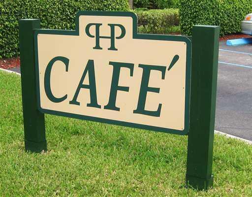 6149 Pointe Regal Circle, Unit 108 Delray Beach, FL 33484 - Photo 54 of 56 a view of a back yard of the house