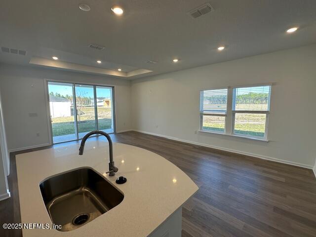 156 Camphor Laurel Road St. Augustine, FL 32092 - Photo 6 of 34 a kitchen with a sink and chandelier