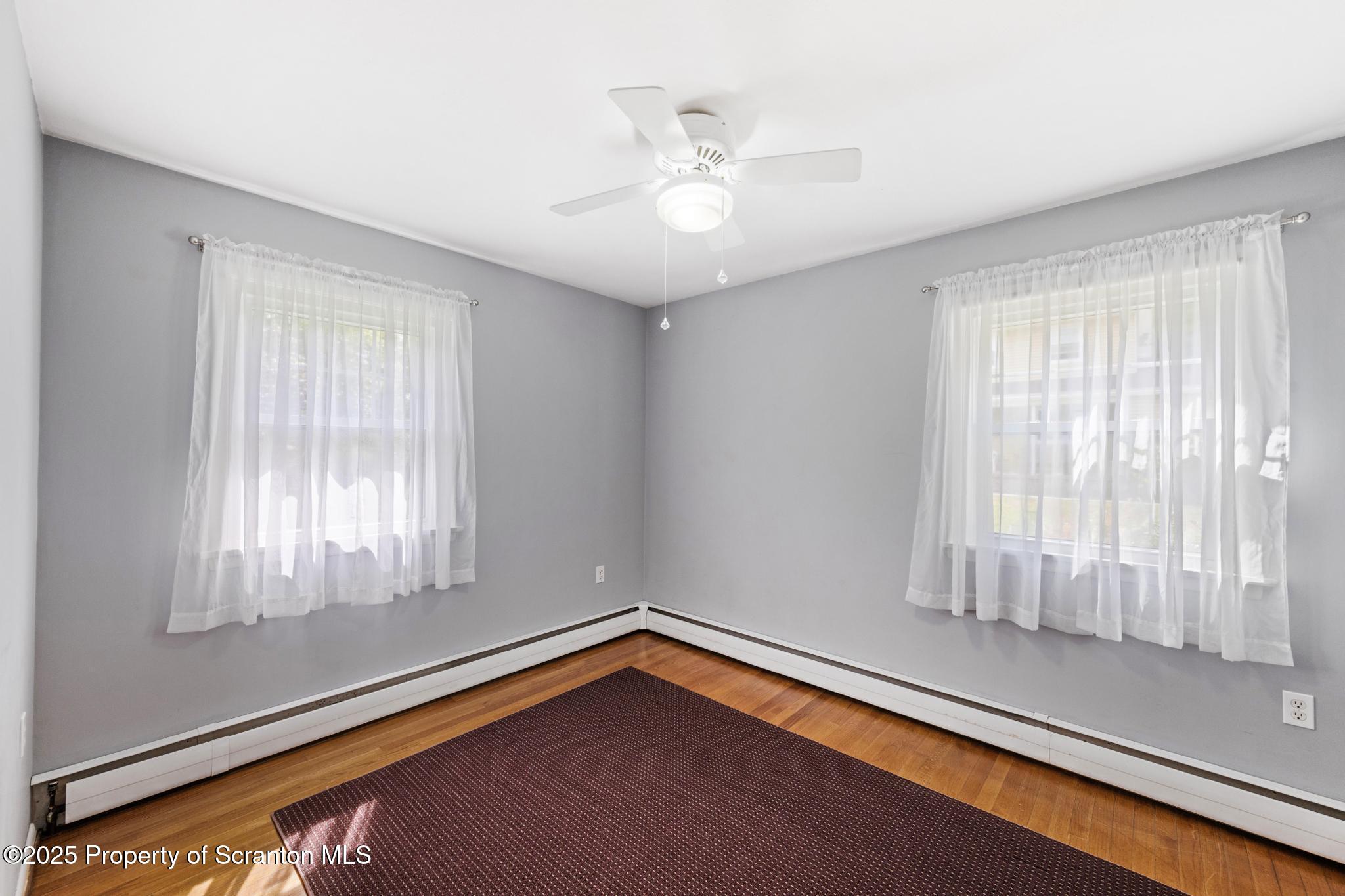 525 Knapp Road Clarks Summit, PA 18411 - Photo 13 of 45 a view of an empty room with a window
