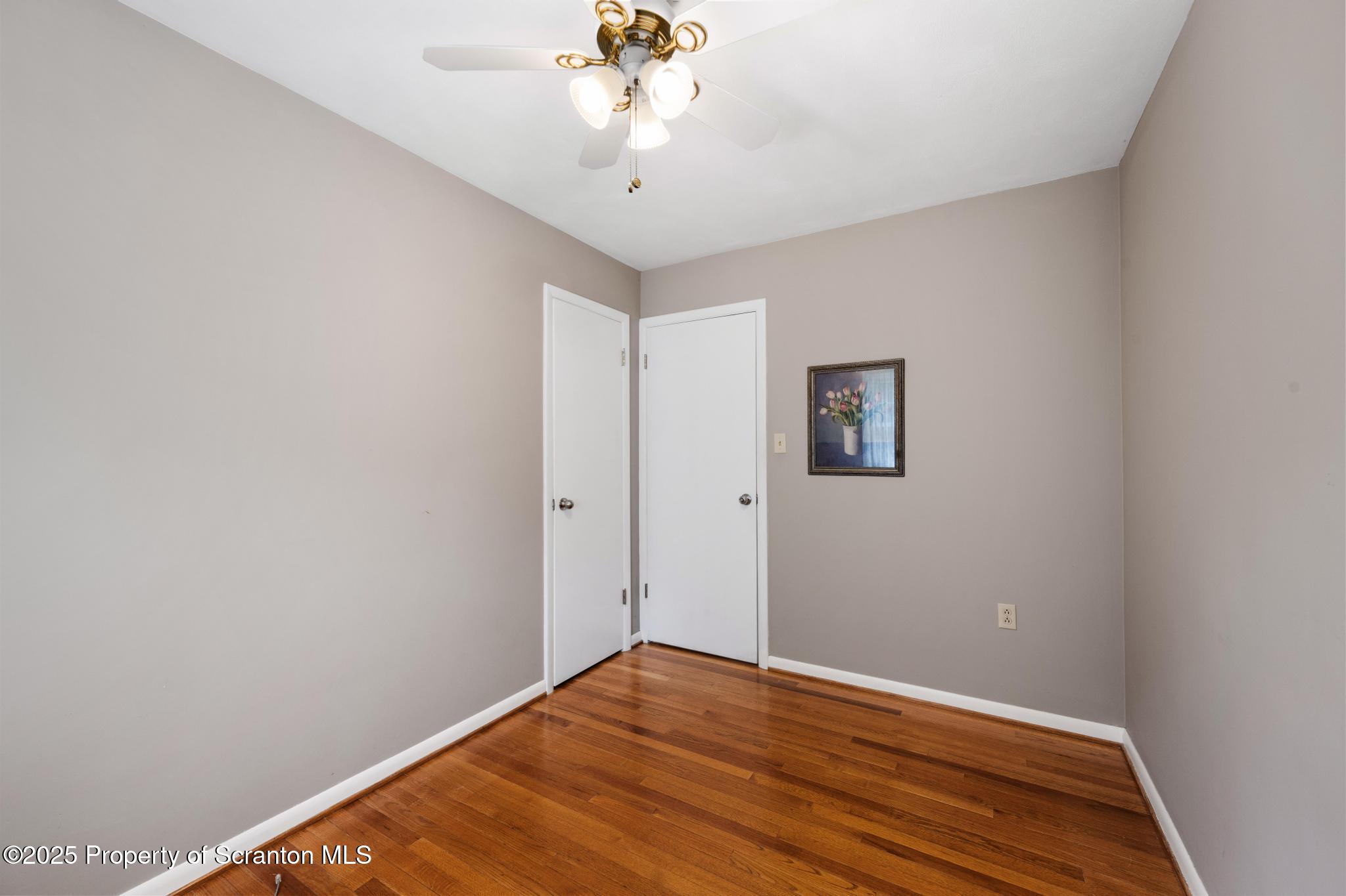525 Knapp Road Clarks Summit, PA 18411 - Photo 22 of 45 a view of empty room with wooden floor