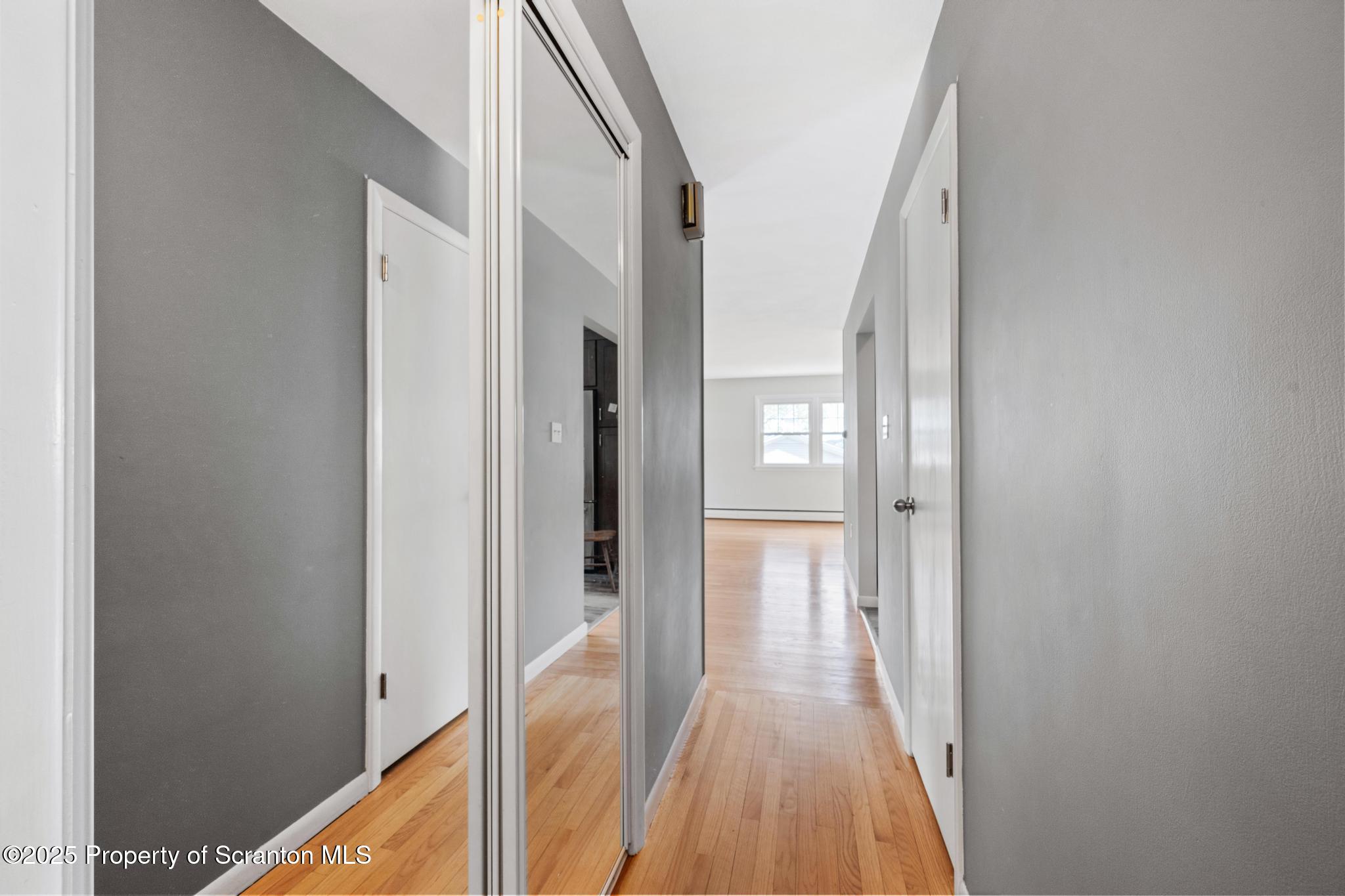 525 Knapp Road Clarks Summit, PA 18411 - Photo 25 of 45 a view of a hallway with wooden floor