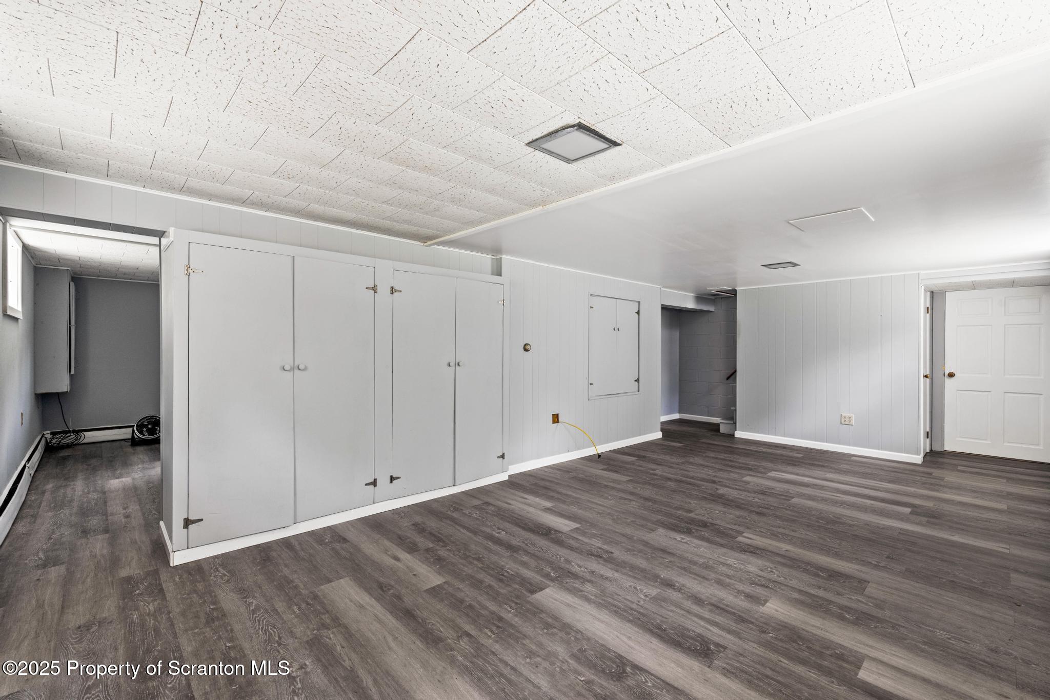 525 Knapp Road Clarks Summit, PA 18411 - Photo 29 of 45 a view of empty room with wooden floor