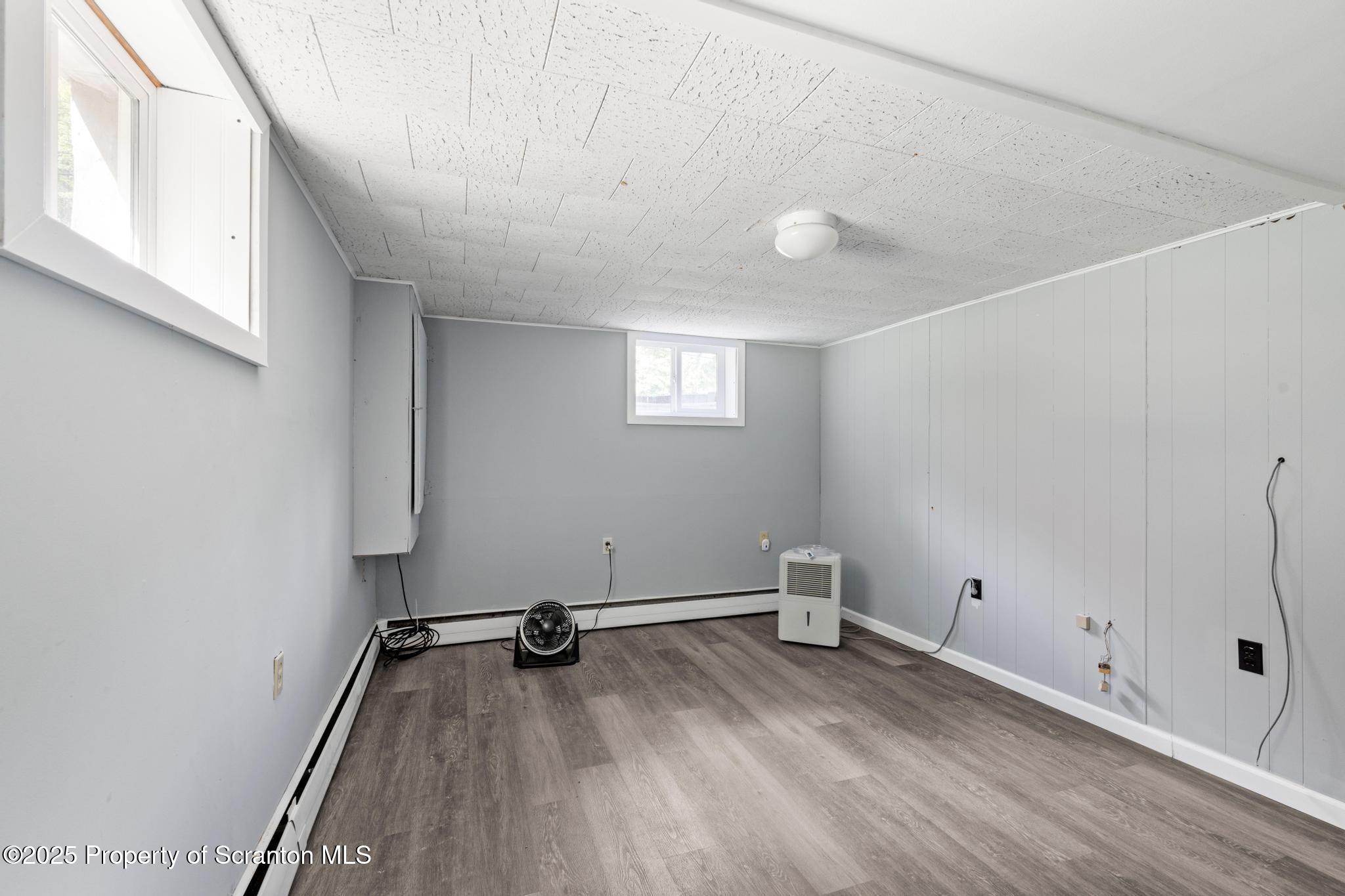525 Knapp Road Clarks Summit, PA 18411 - Photo 30 of 45 a view of a room with rack on the wall and a window